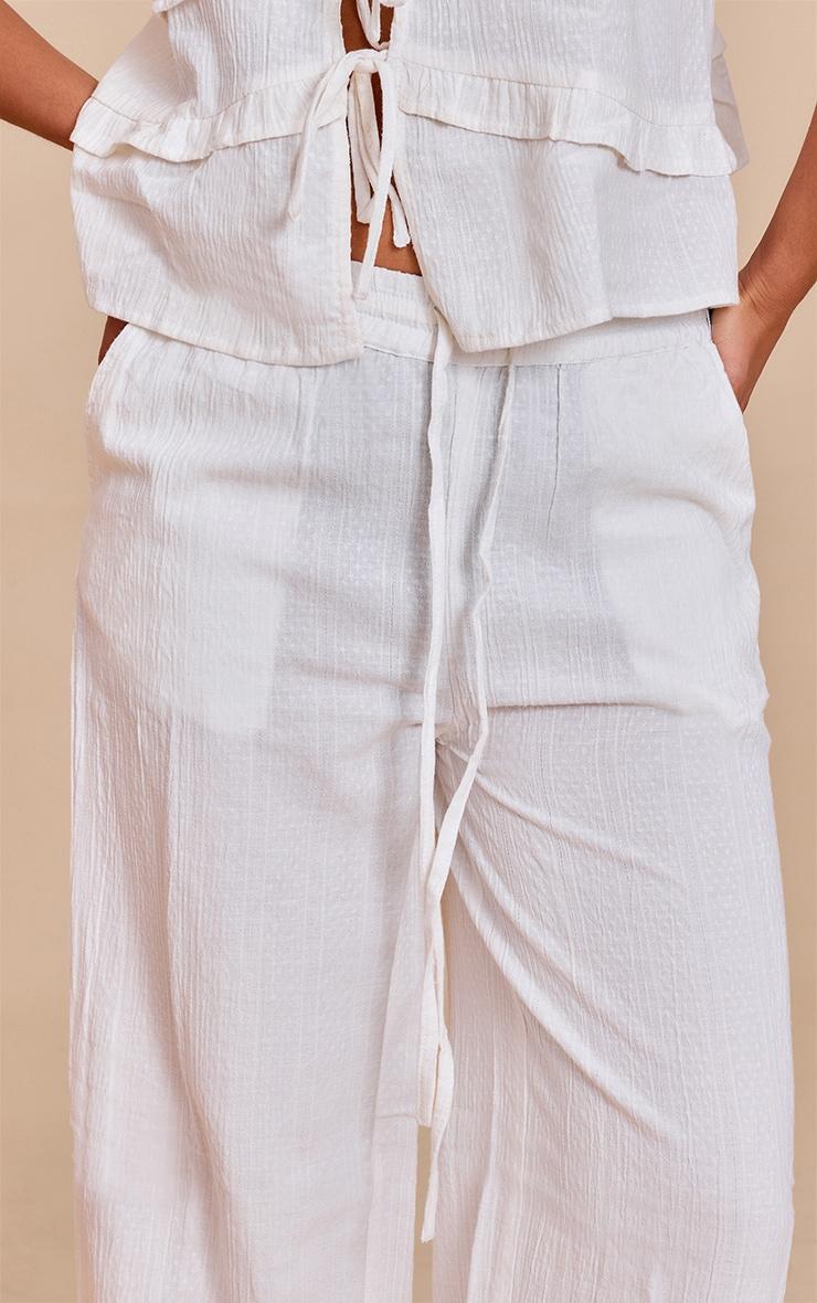 White Textured Mid Rise Wide Leg Pants Product Image
