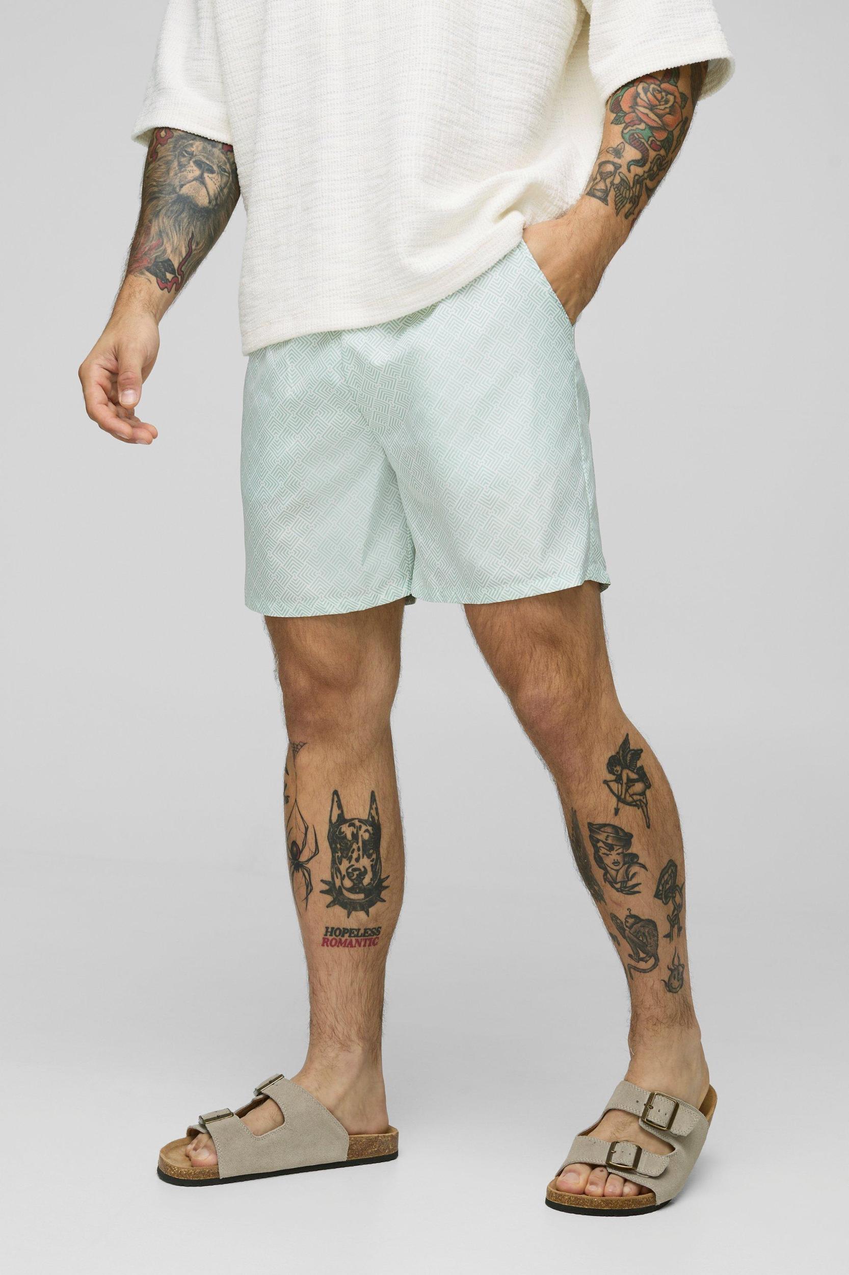 Geo Pattern Mid Length Swim Short | boohooMAN USA Product Image