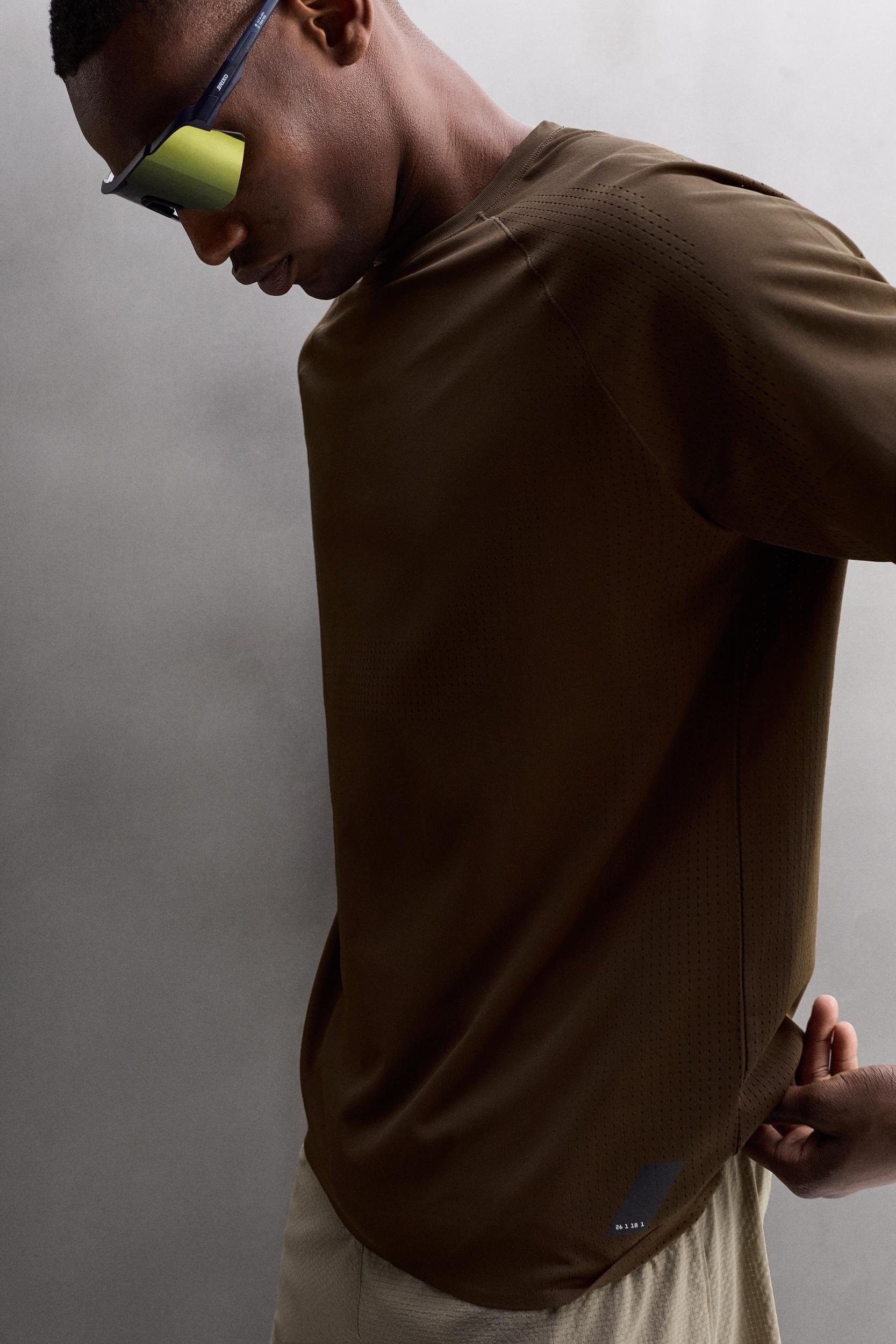 OPEN KNIT STRUCTURE T-SHIRT Product Image