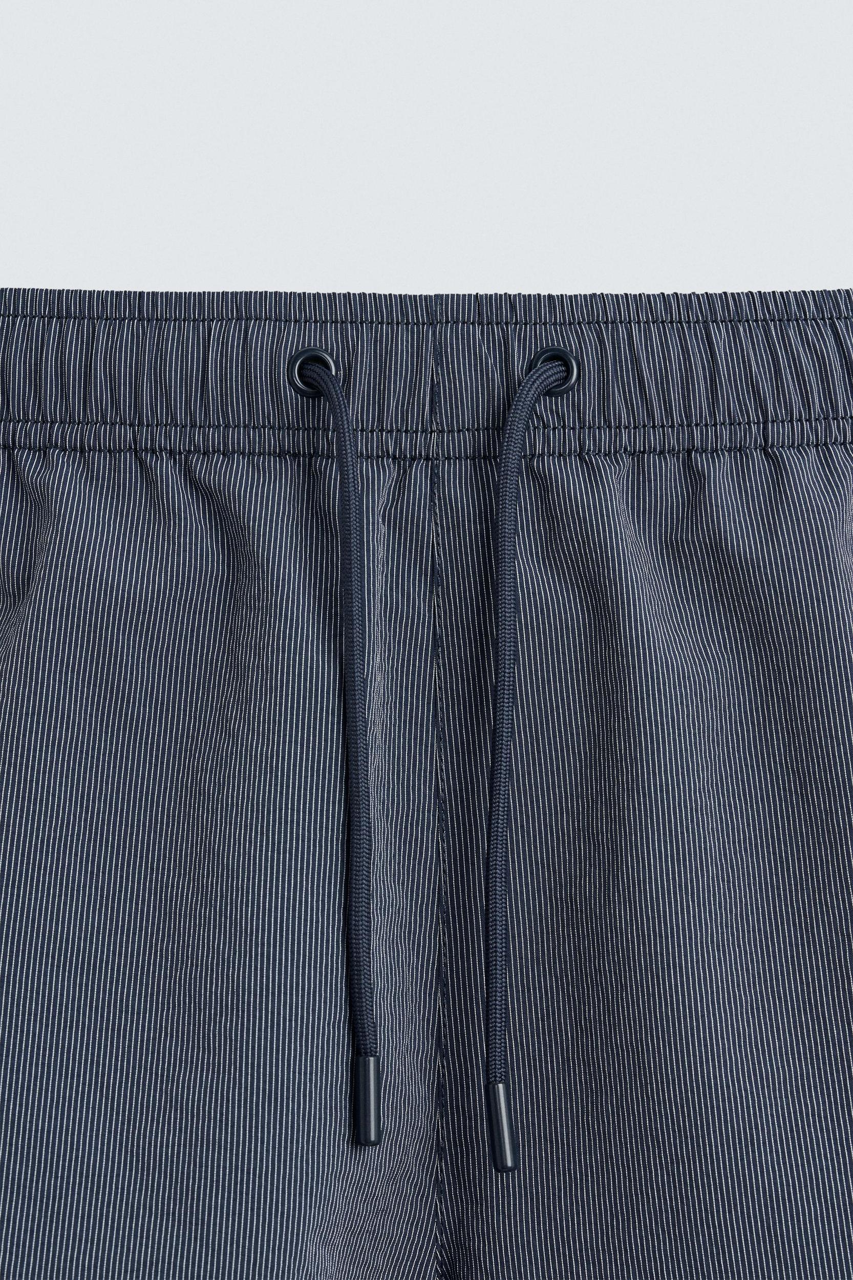 STRIPED MID-LENGTH SWIMSUIT Product Image