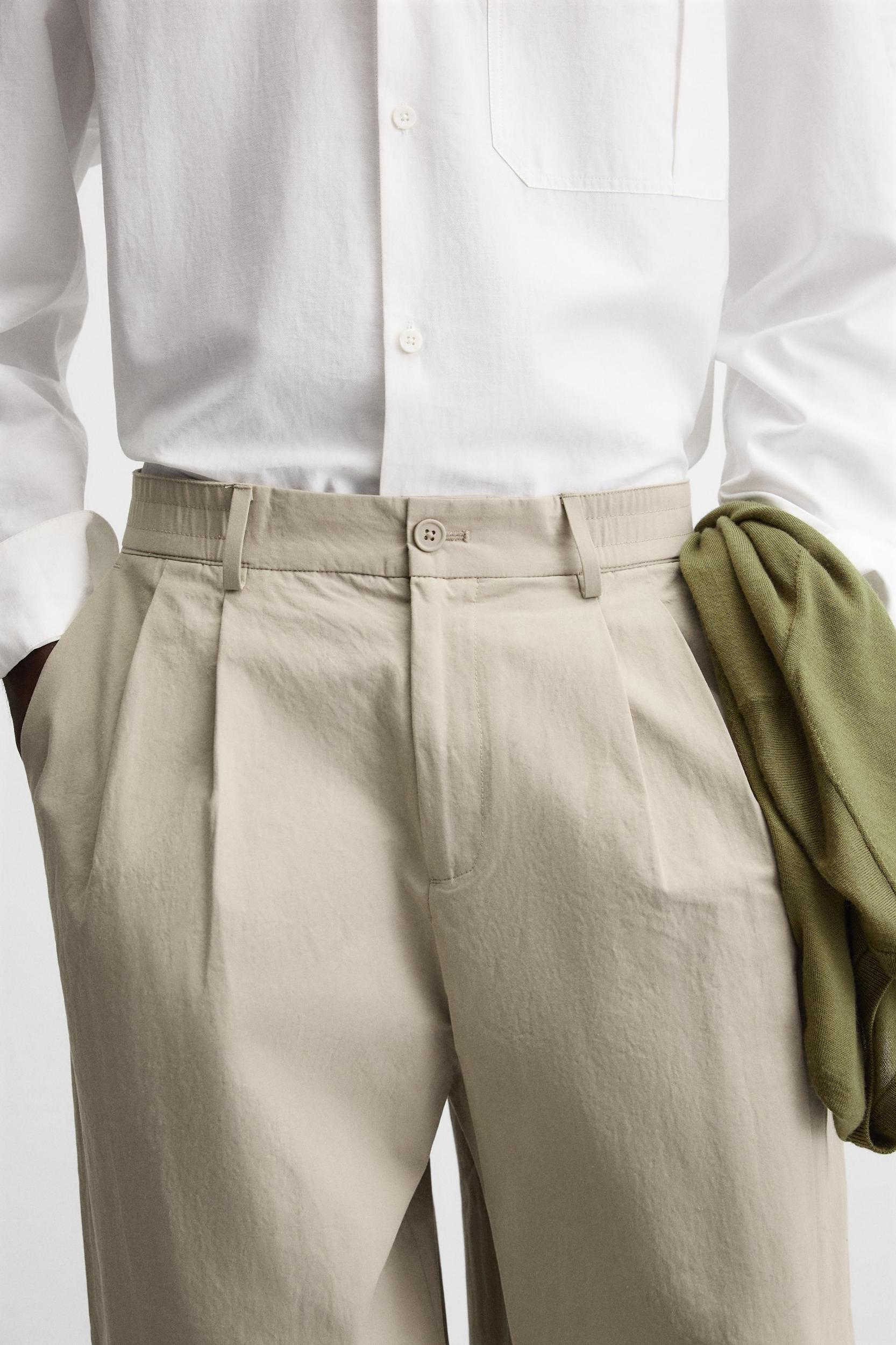 PLEATED CHINO PANTS Product Image