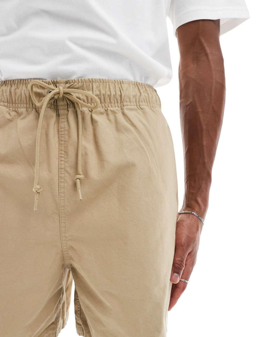 Nike Club woven shorts in beige Product Image