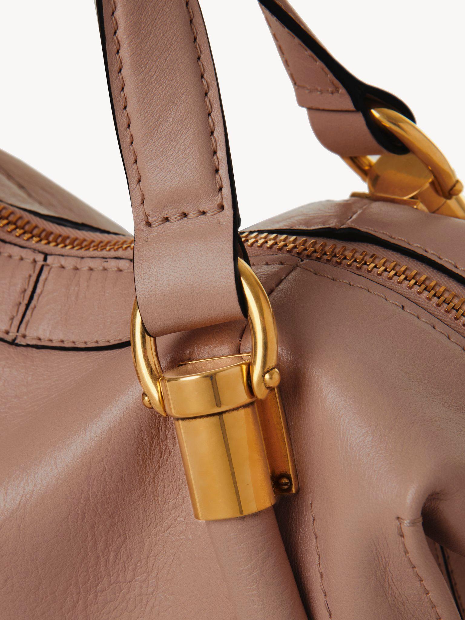 Small Paraty 24 bag in shiny leather Product Image