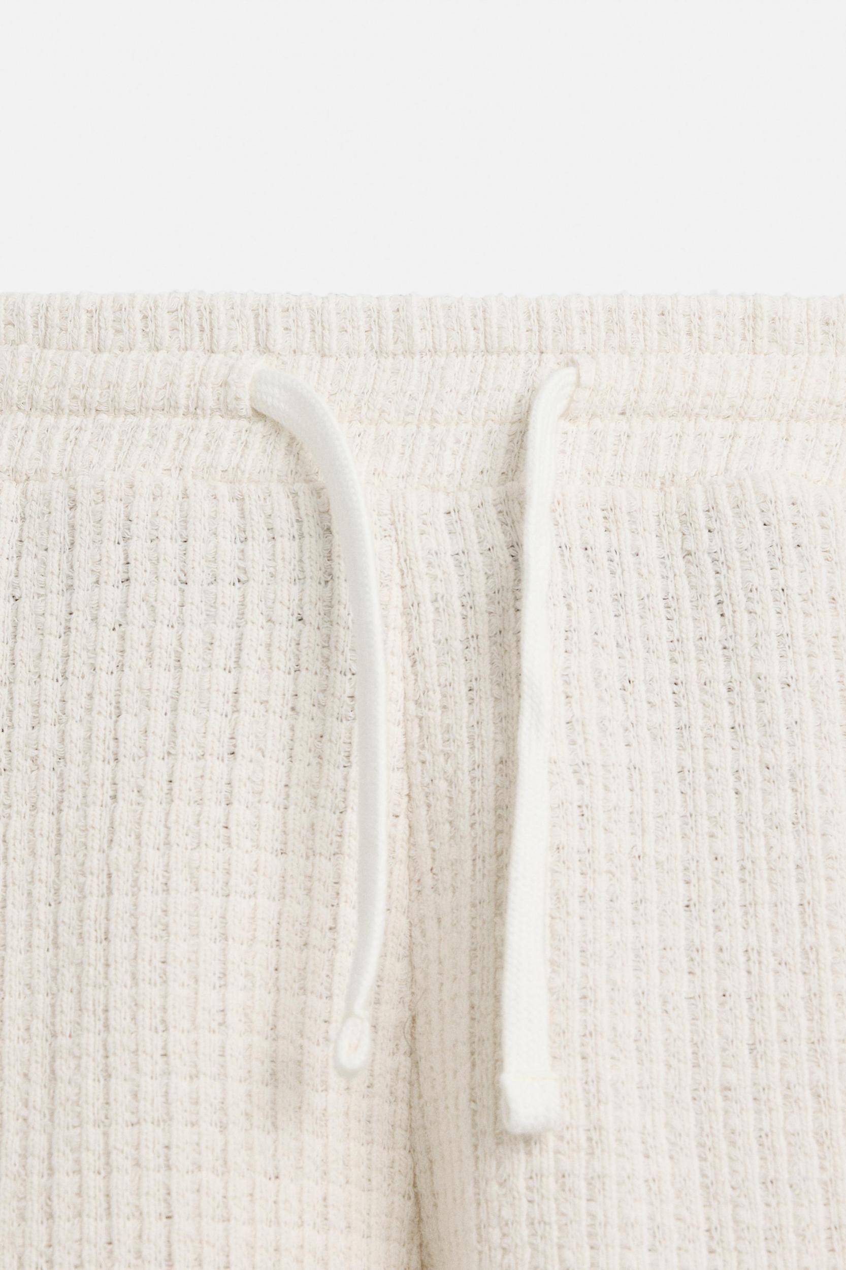 TEXTURED JOGGER SHORTS Product Image