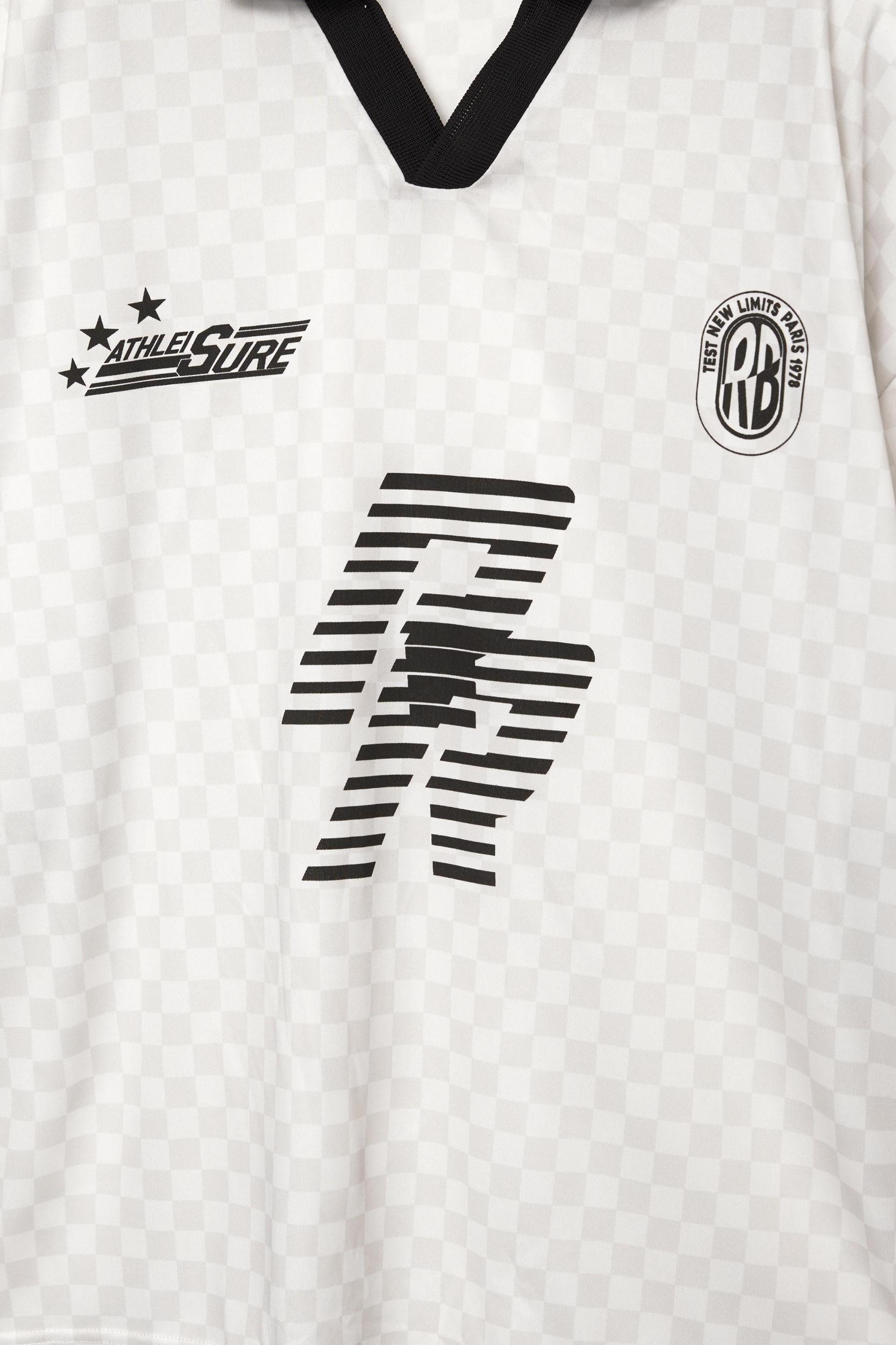 Plaid STWD football T-shirt Product Image