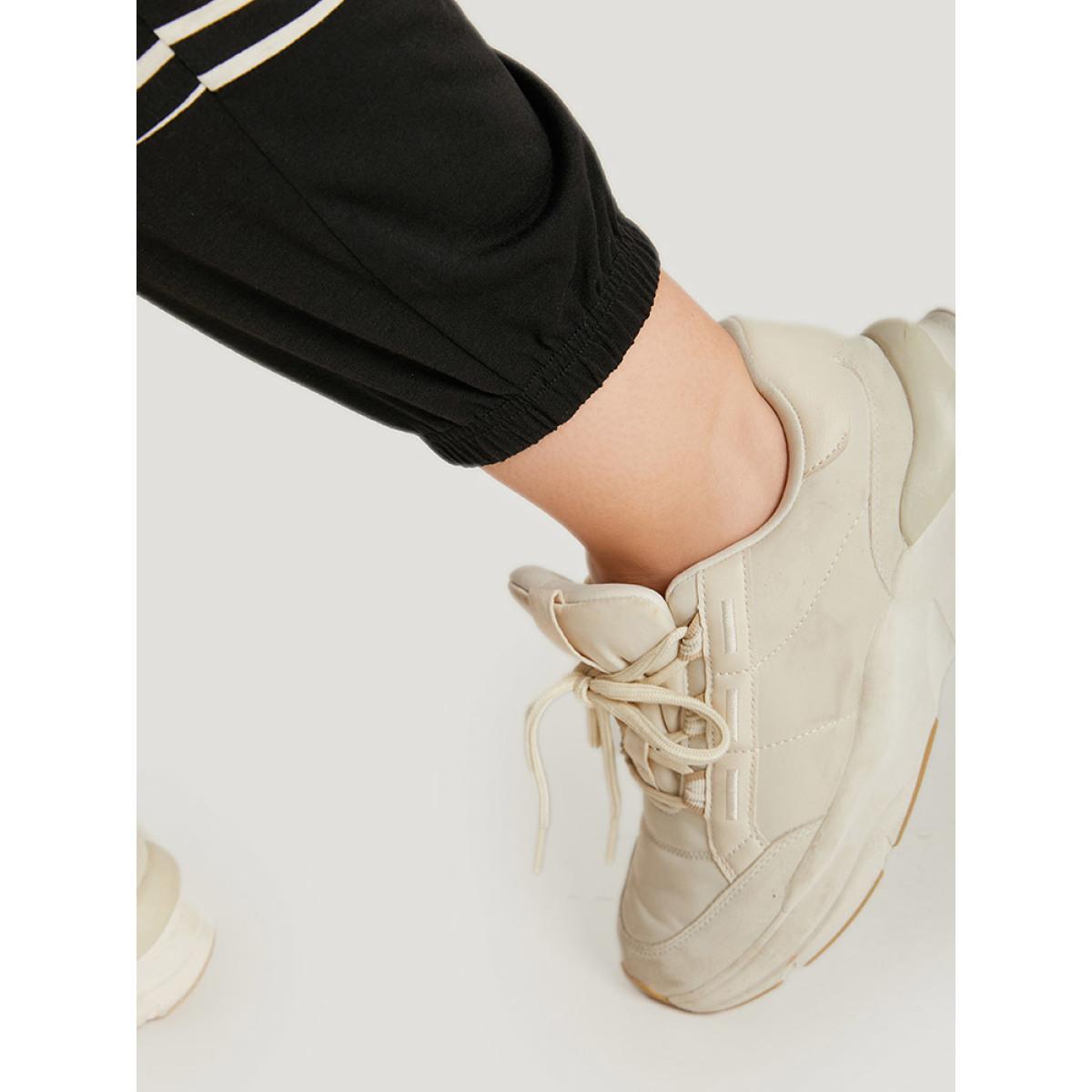 Striped Patchwork Elastic Waist Pocket Ties Sweatpants Black Plus Size Women Casual Dailywear Patchwork 30/6X Bloomchic Product Image