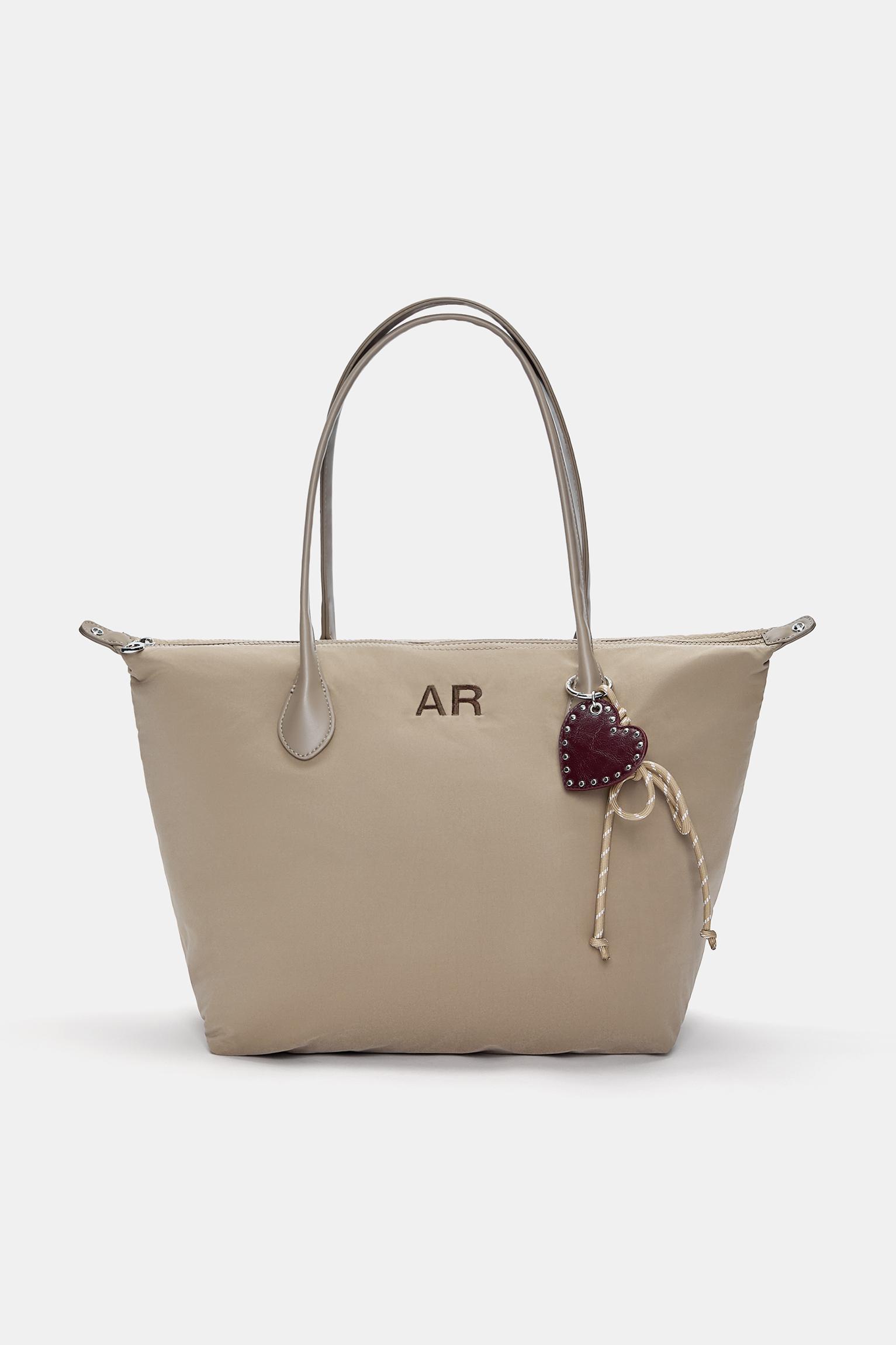 Nylon shopper bag with charm detail Product Image