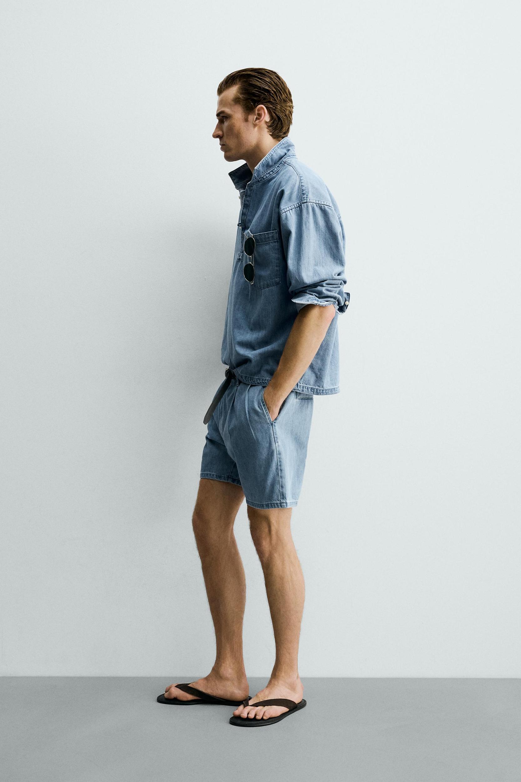 RELAXED FIT PLEATED DENIM SHORTS Product Image