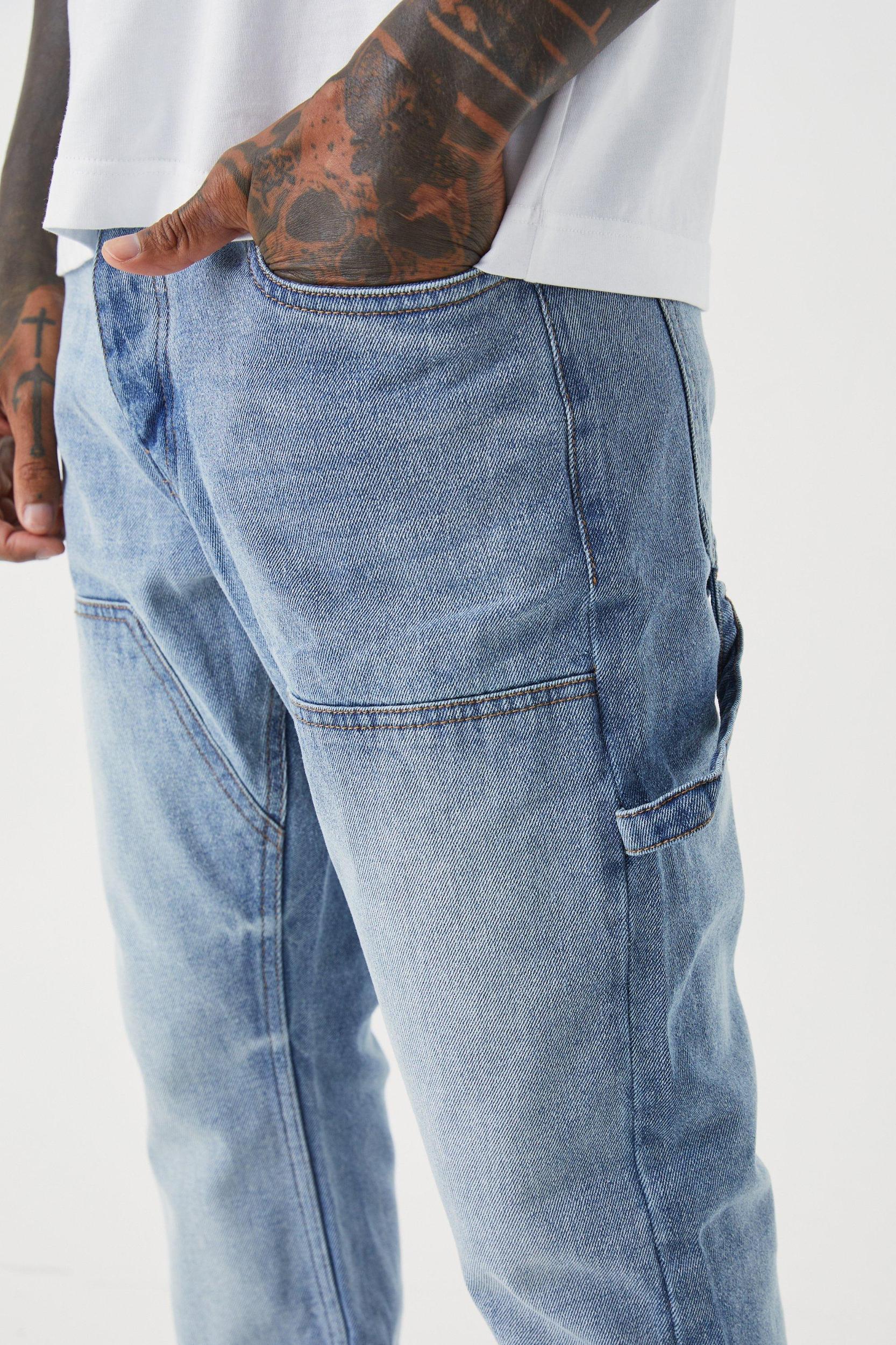 Slim Rigid Flare Carpenter Jeans | boohooMAN USA Product Image