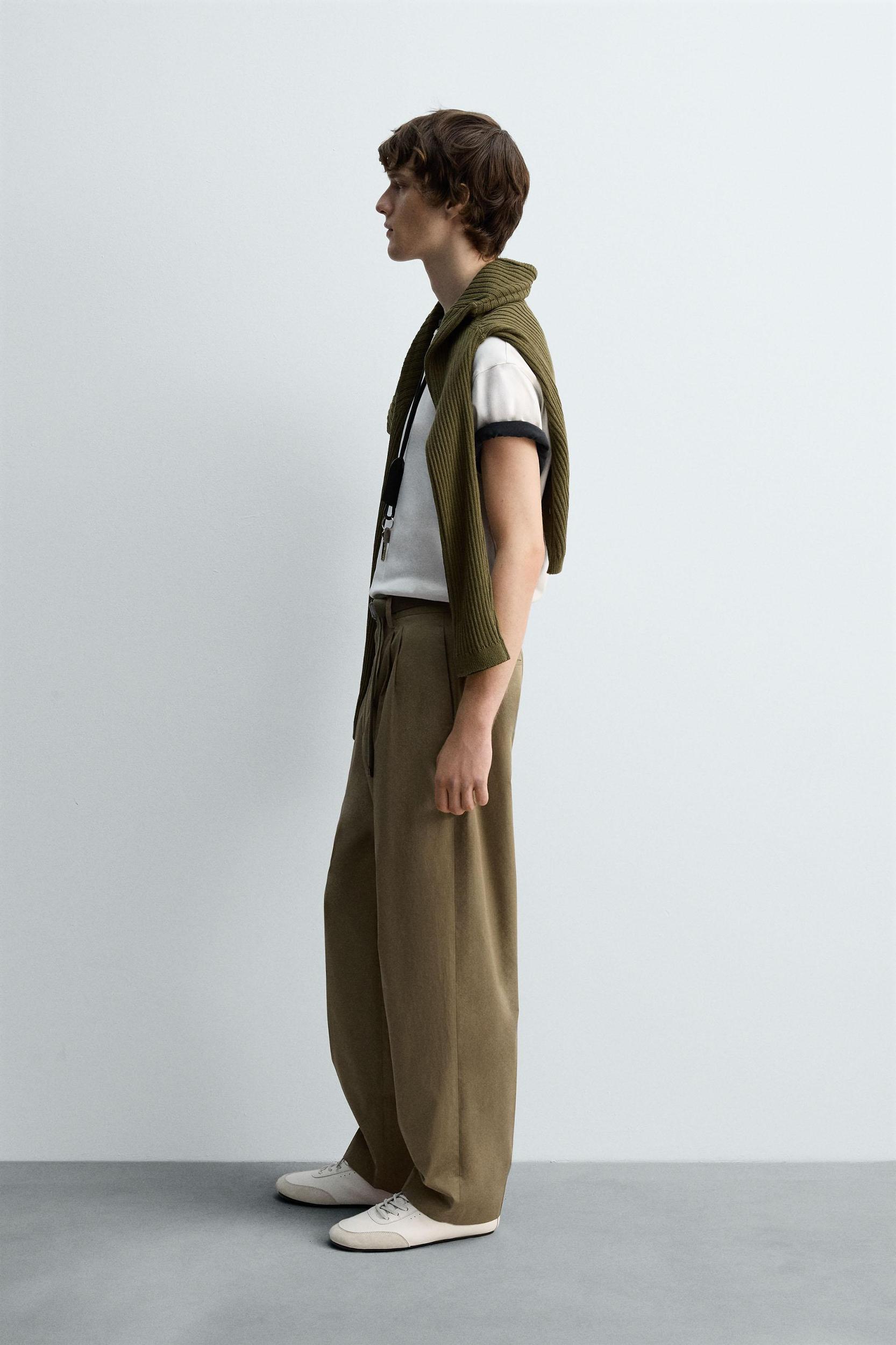 LIMITED EDITION RELAXED FIT PLEATED PANTS Product Image