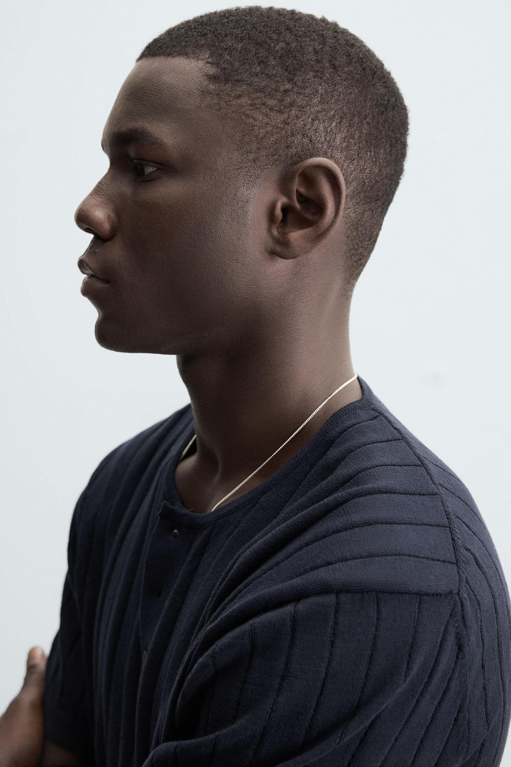 KNIT T-SHIRT WITH BUTTONED NECK Product Image