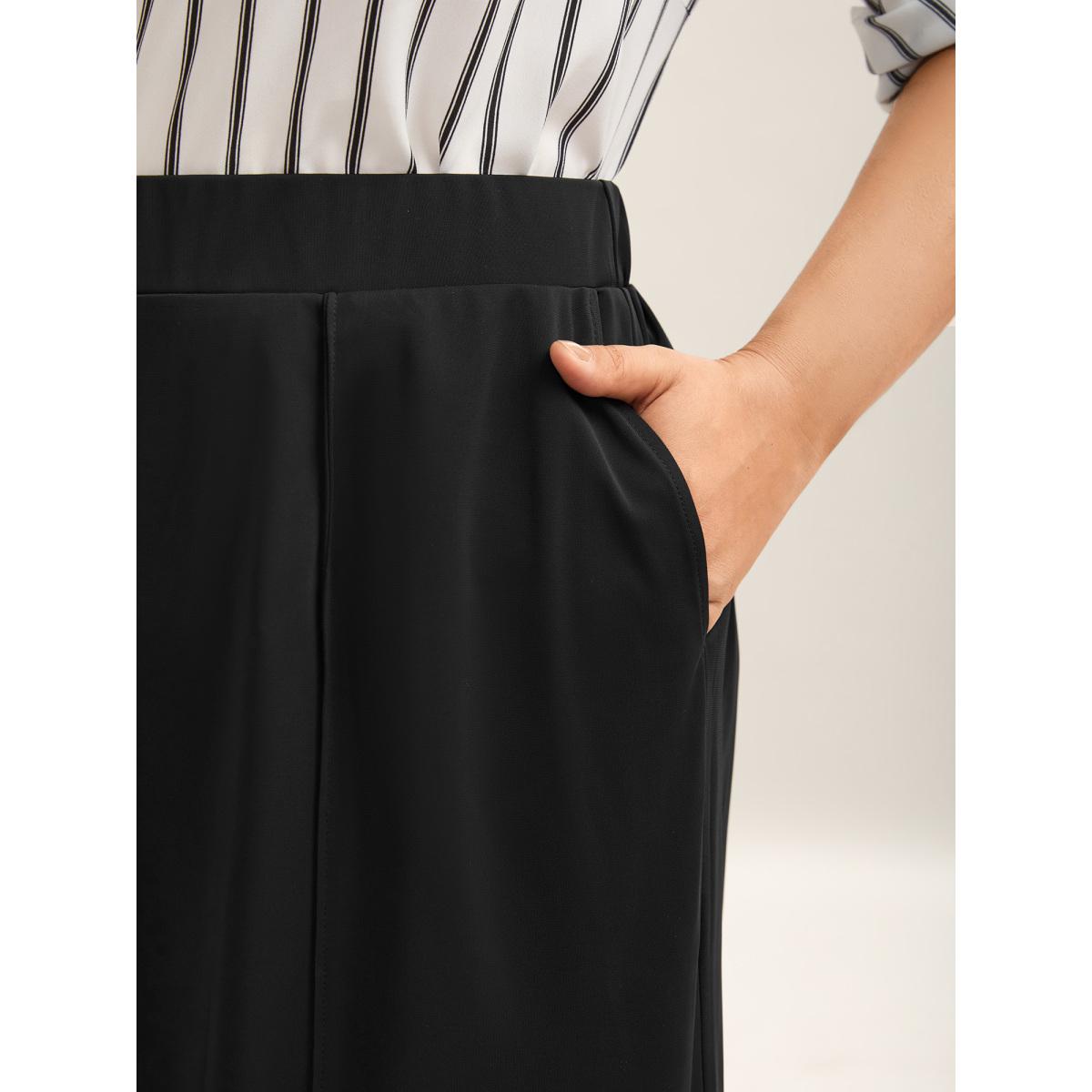 Plus Size Stretchy Pleated Pockets Wide-Leg Pants Women Black At the Office Wide Leg Mid Rise Work Pants BloomChic 10/M Product Image