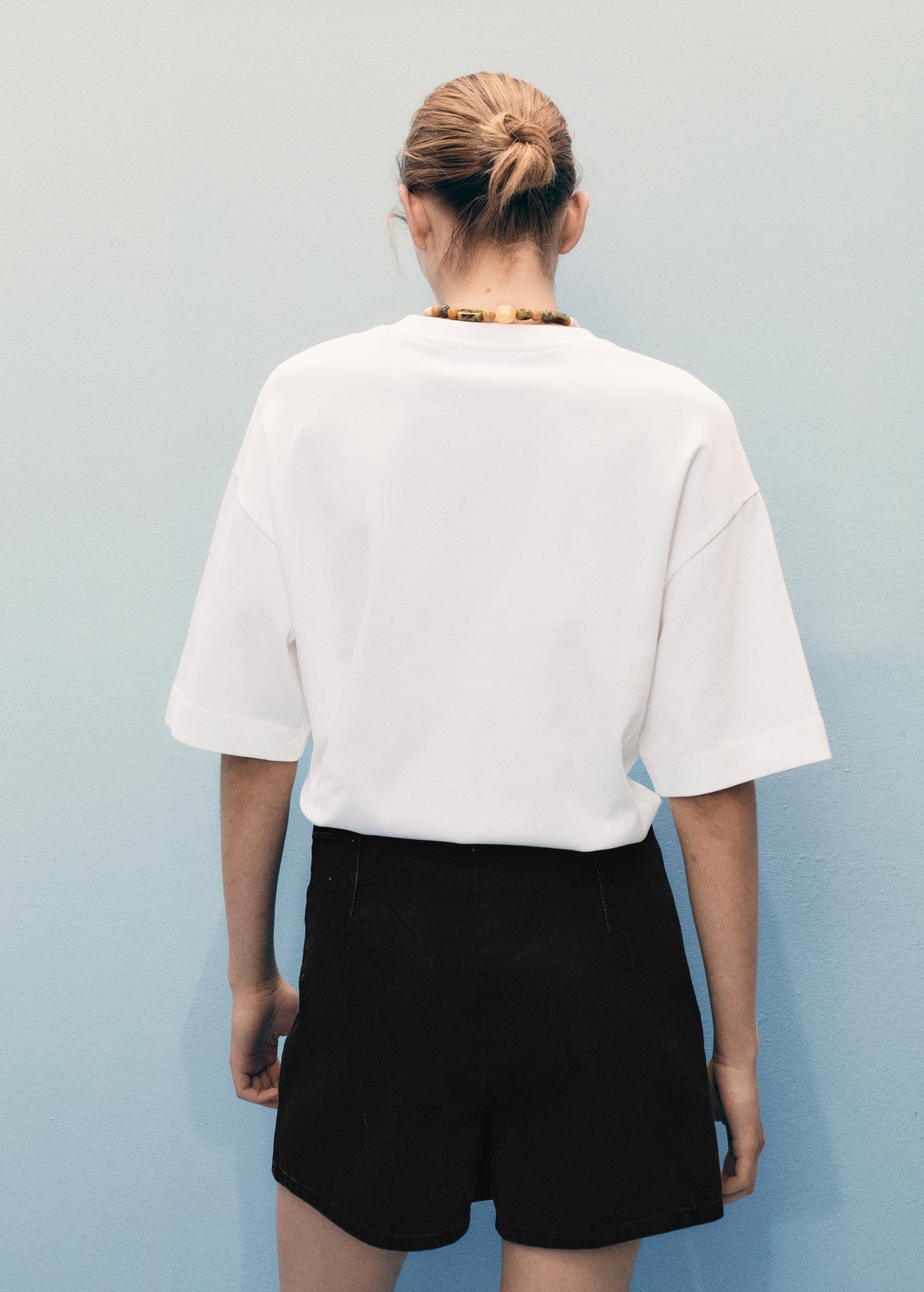 Wrapped denim skort - Women | MANGO USA Product Image