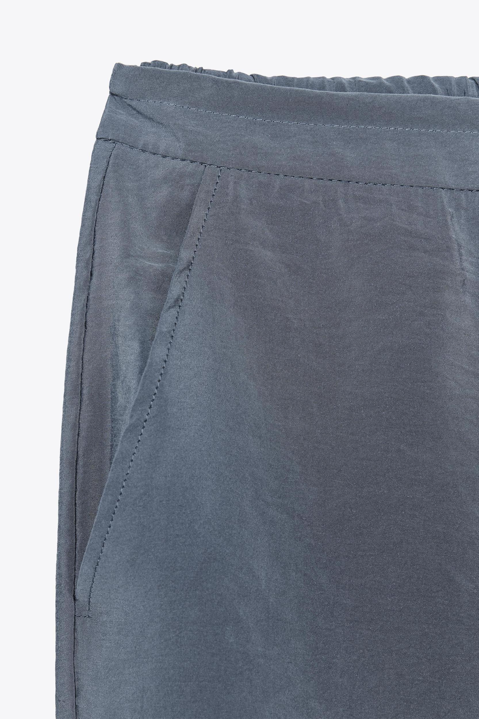 FLOWY PANTS WITH BUTTONS Product Image