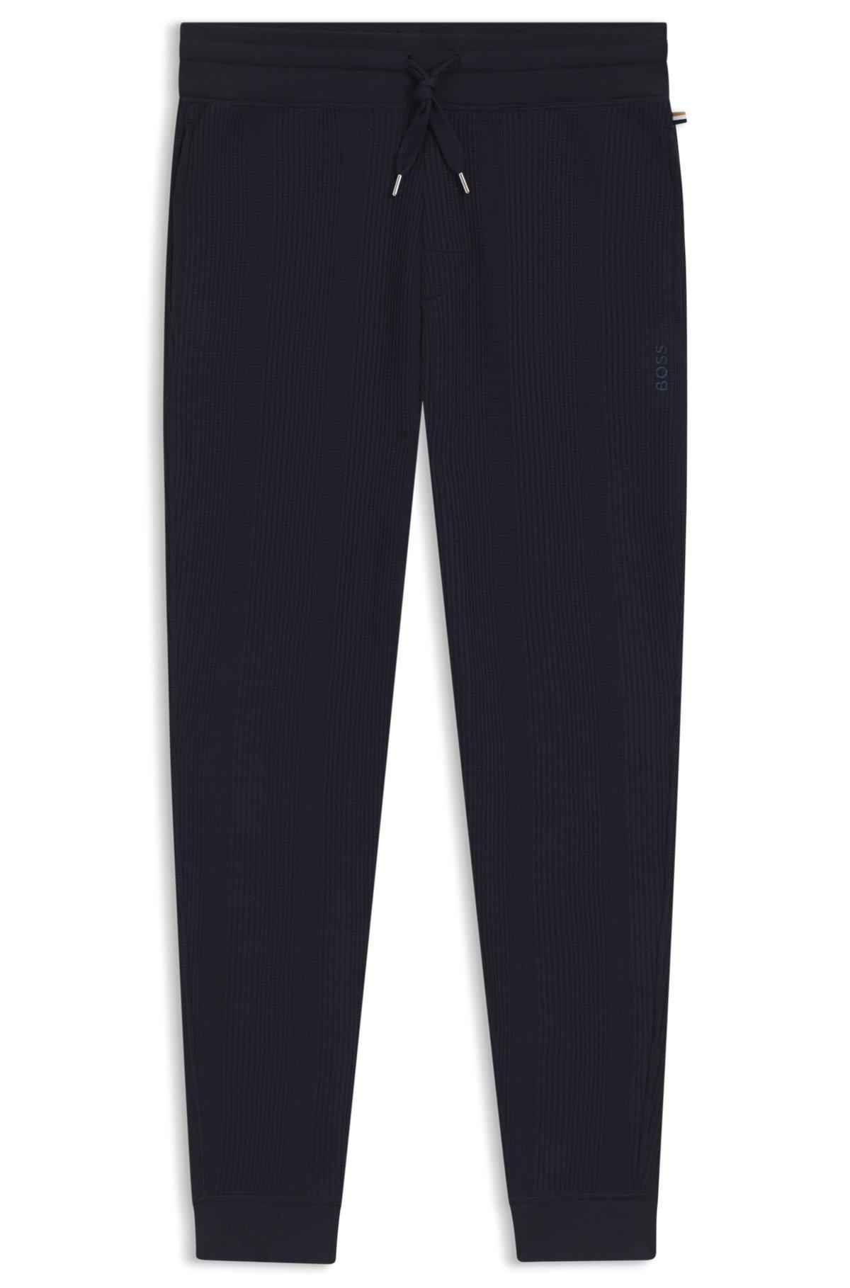 Cotton tracksuit bottoms with embroidered logo Product Image