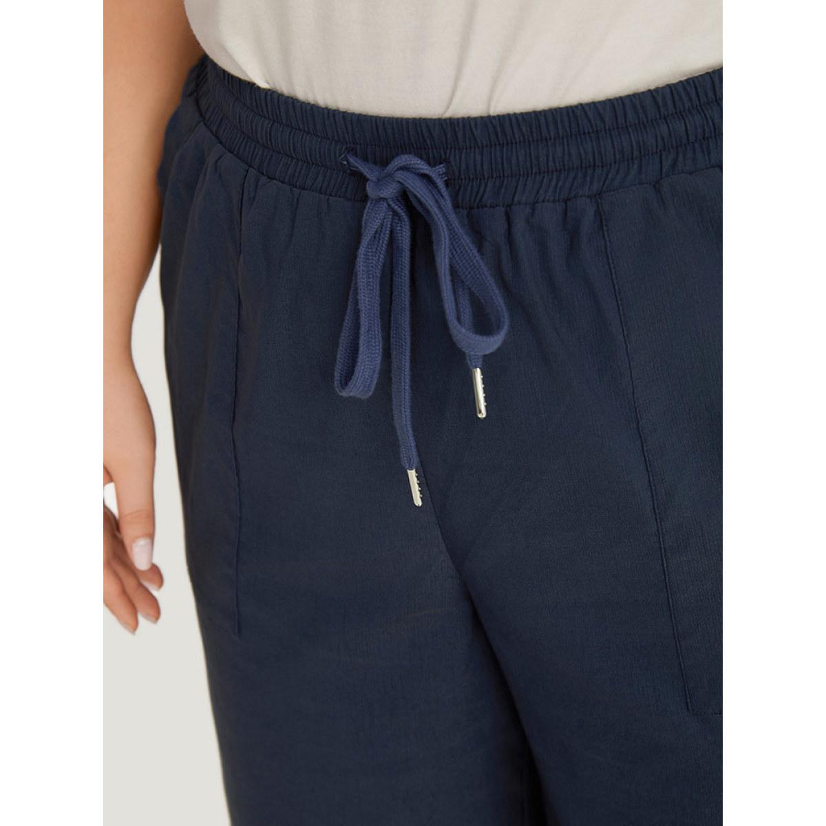 Plus Size Plain Pocket Drawstring Split HemWide leg Pants Women Indigo Office Loose Mid Rise Office Pants BloomChic 26/4X Product Image