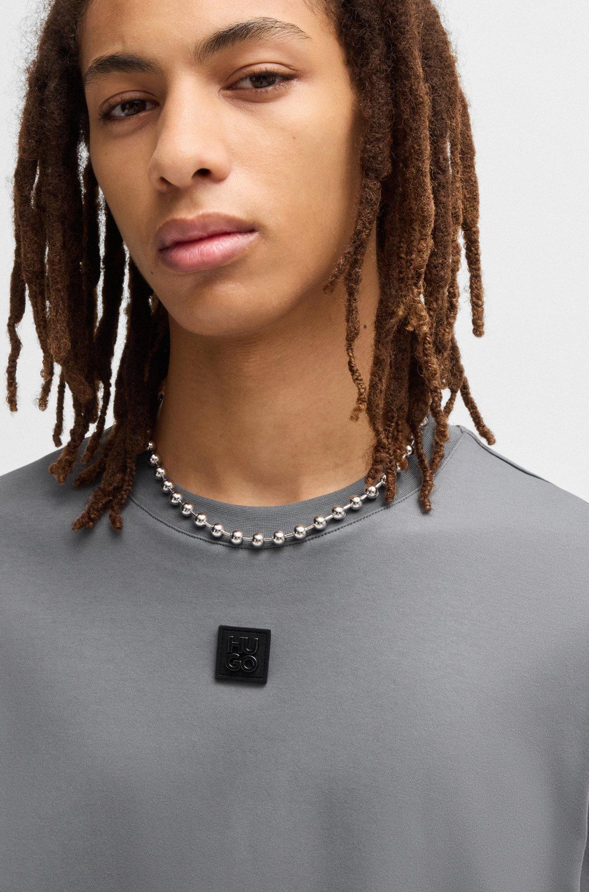 Interlock-cotton T-shirt with metallic stacked-logo badge Product Image