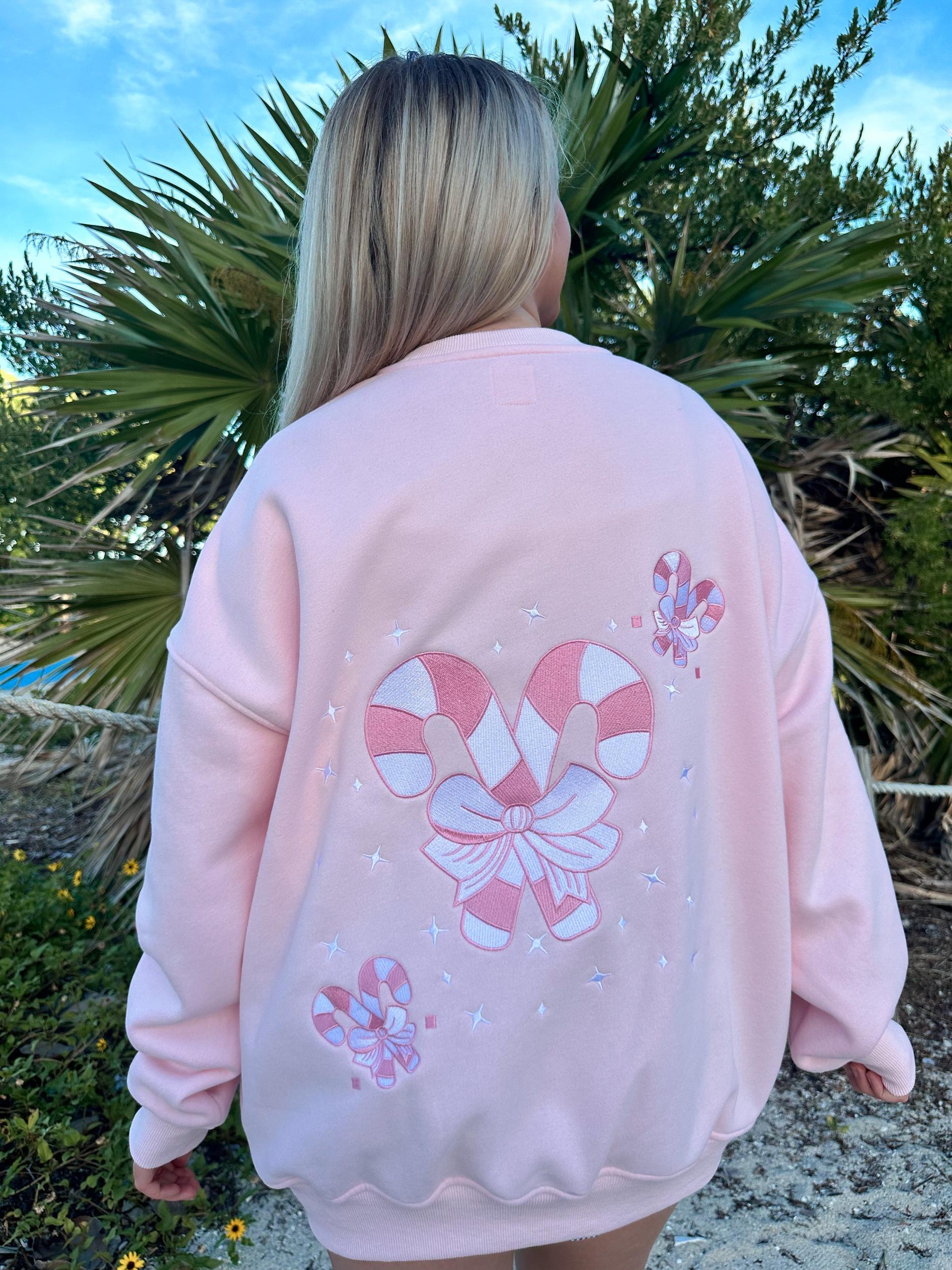 Light Pink Candy Cane Wonderland Sweatshirt Product Image