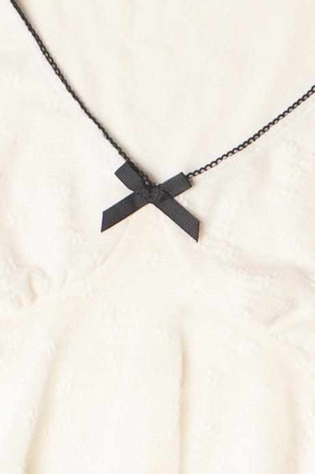 Curved Hem Lace Long Sleeve Bow Top Product Image