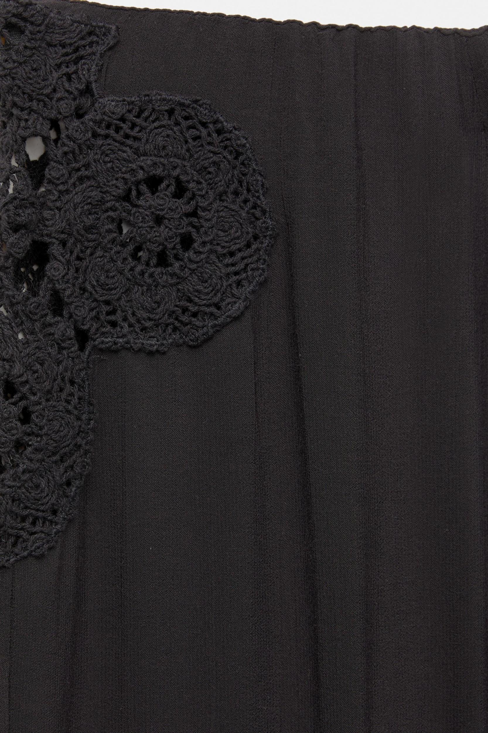 Rustic crochet embroidered trousers Product Image