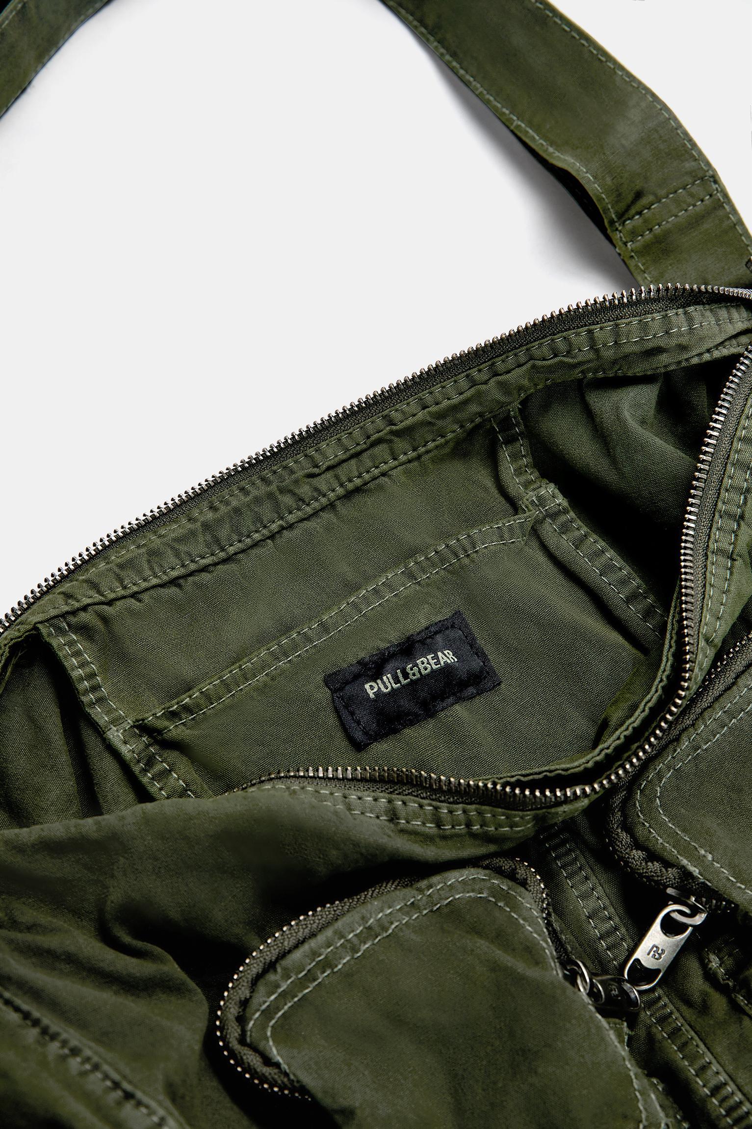 Canvas crossbody bag with pockets Product Image