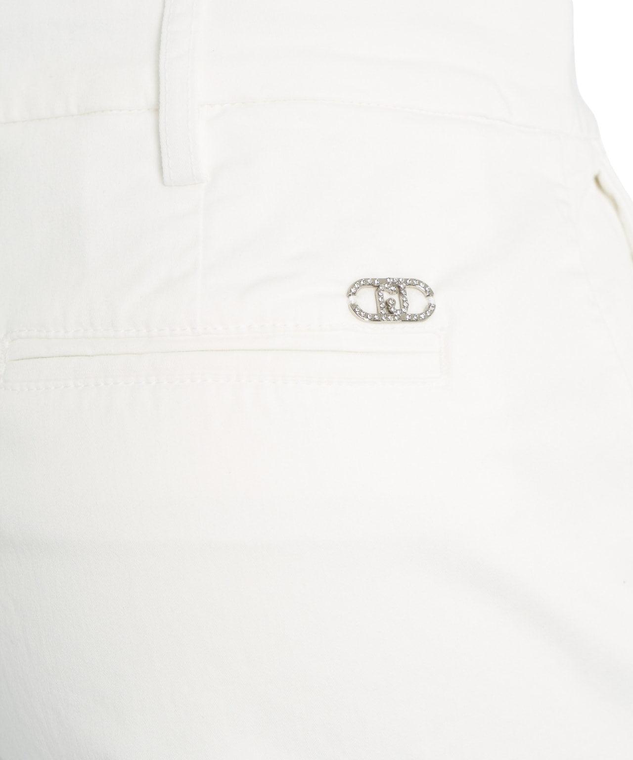Chino pants with applique Product Image