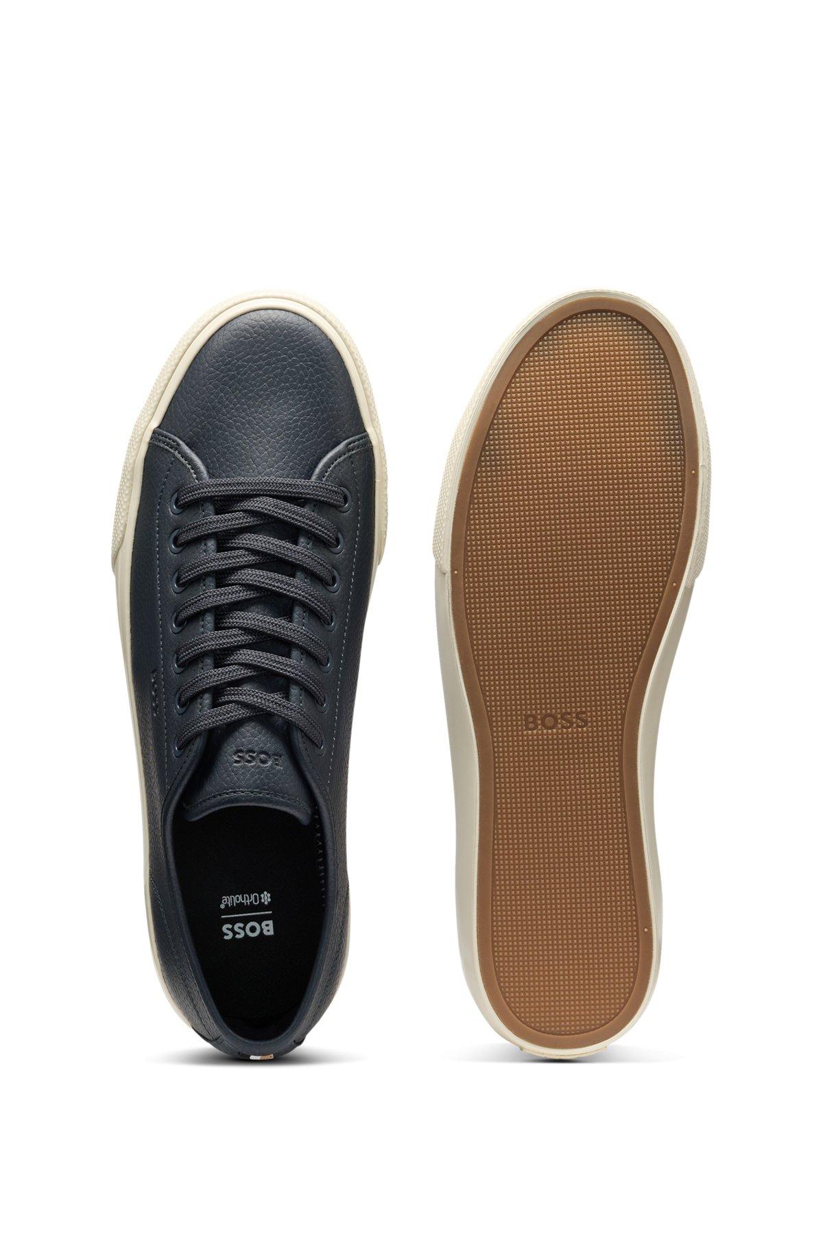 Low-top trainers in grained faux leather Product Image