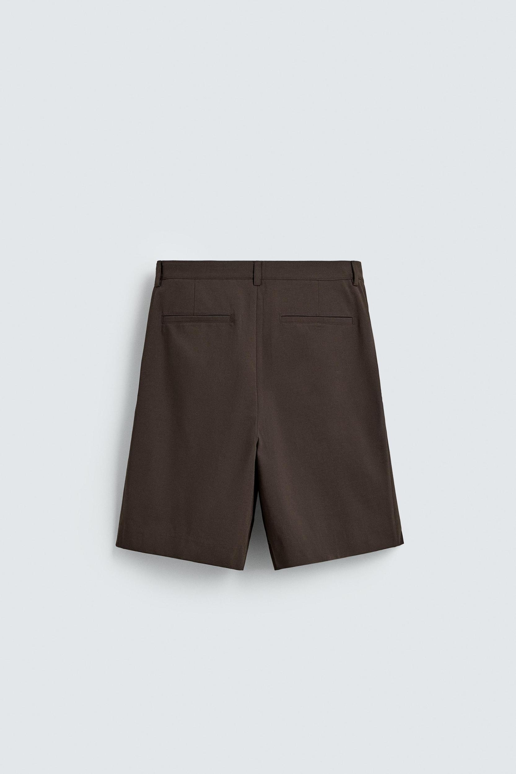 RELAXED FIT PLEATED SHORTS Product Image