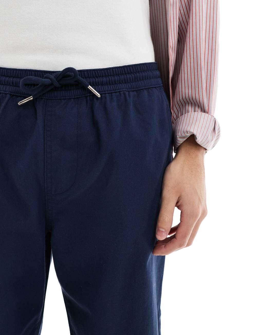 ASOS DESIGN straight leg pull on chino pants in navy Product Image
