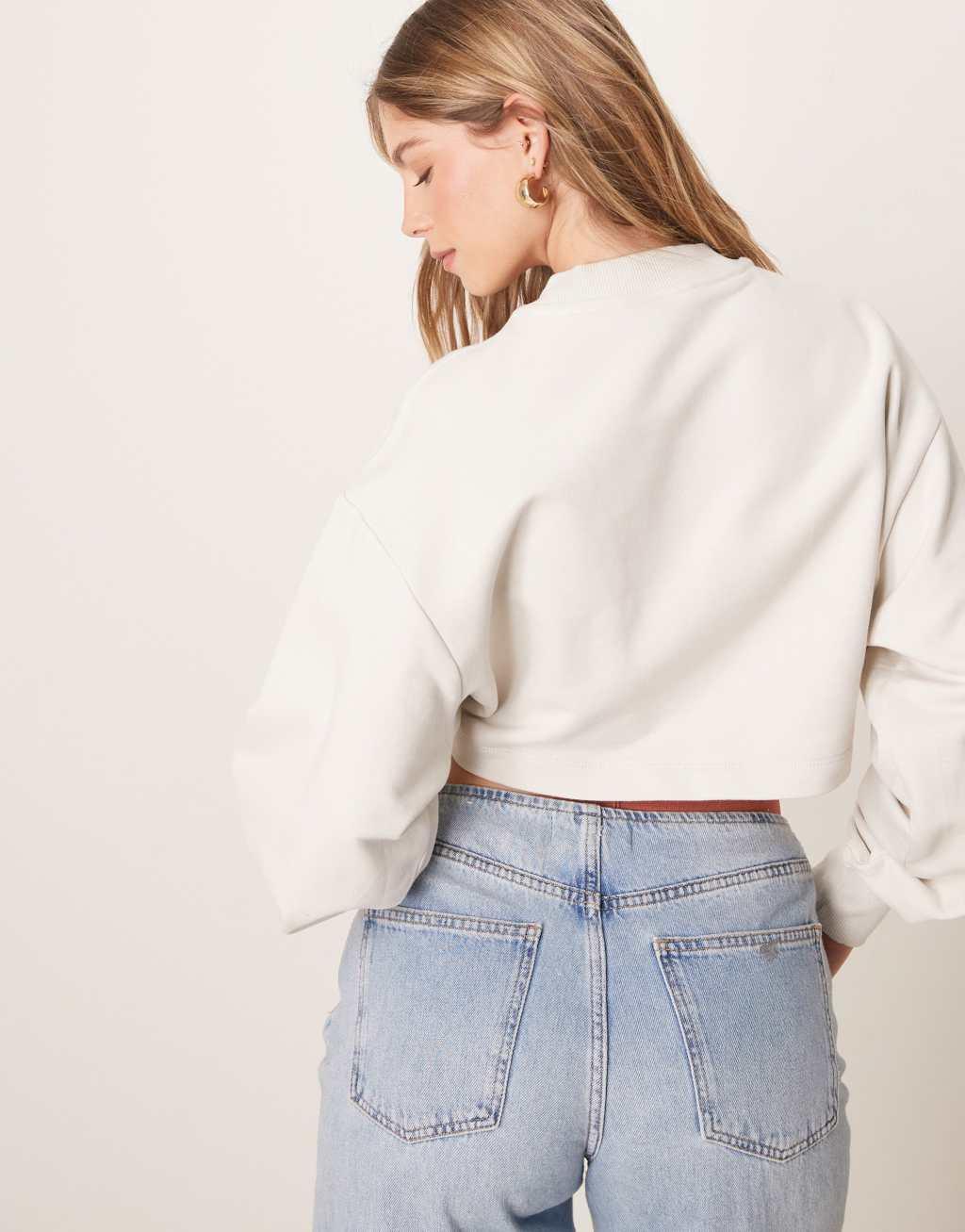 Calvin Klein Jeans woven label sweatshirt in off-white Product Image