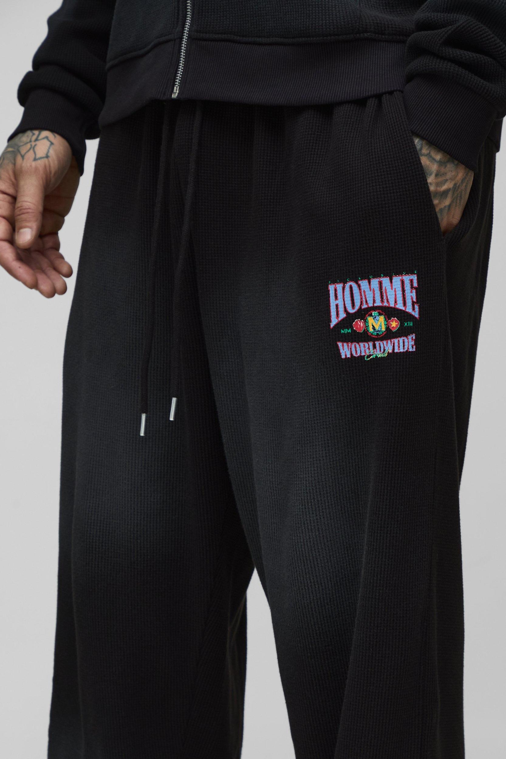 Tall Spray Wash Waffle Graphic Oversized Sweatpants | boohooMAN USA Product Image