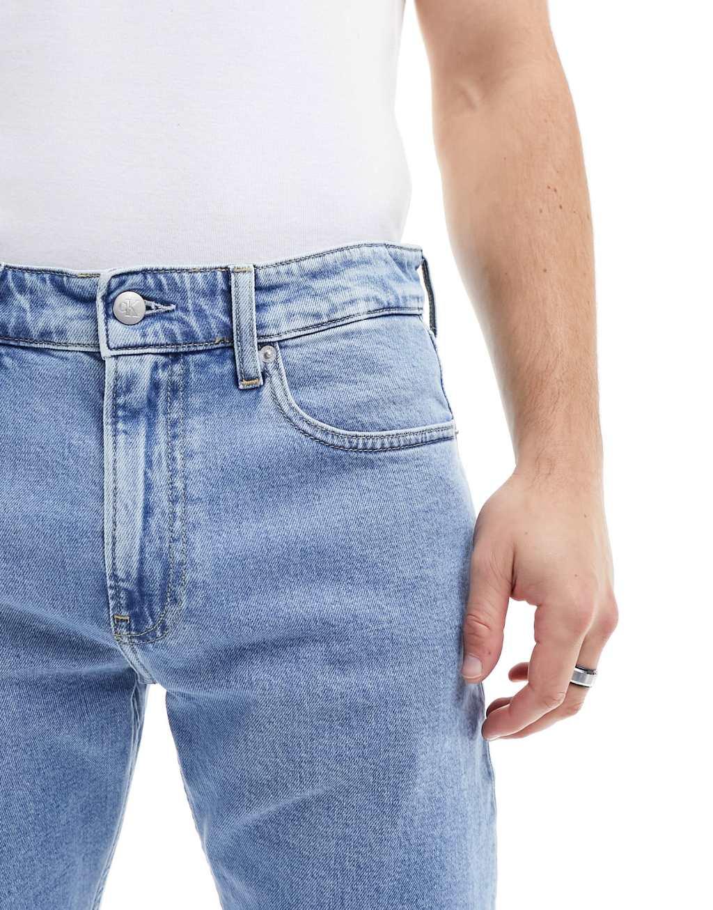 Calvin Klein Jeans slim tapered jeans in light wash Product Image