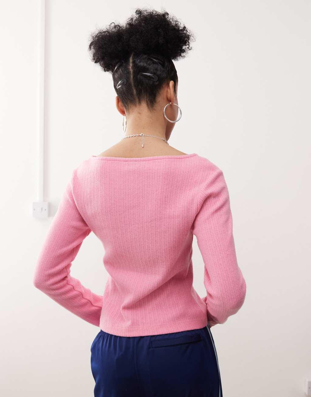 Reclaimed Vintage ribbed button up cardigan in pink Product Image