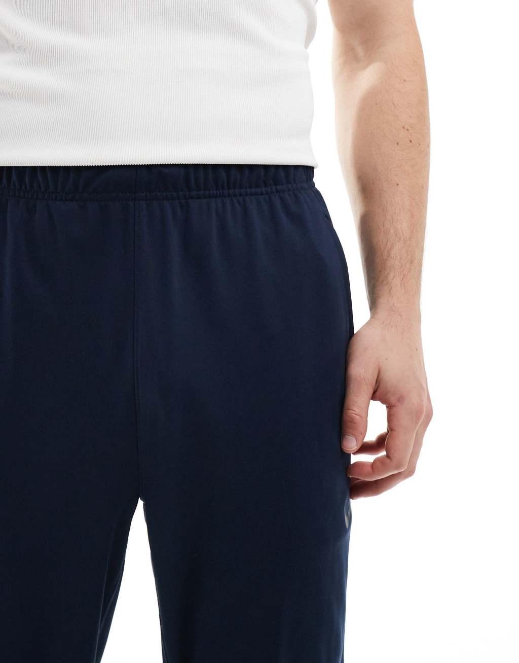 Nike Training Totality knit tapered sweatpants in navy Product Image