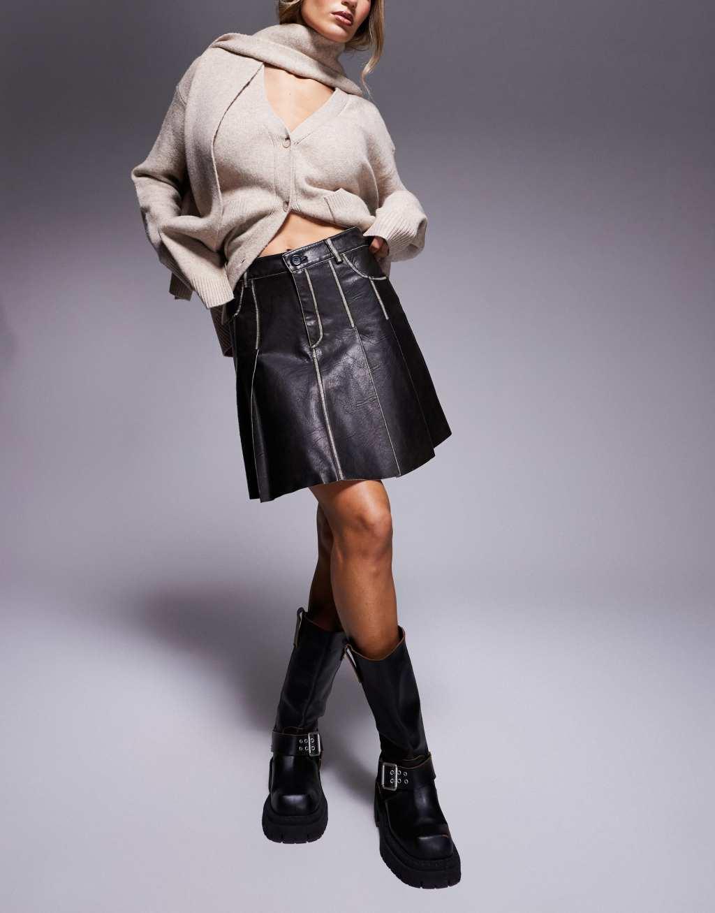 River Island faux leather pleated mini skirt in distressed black Product Image