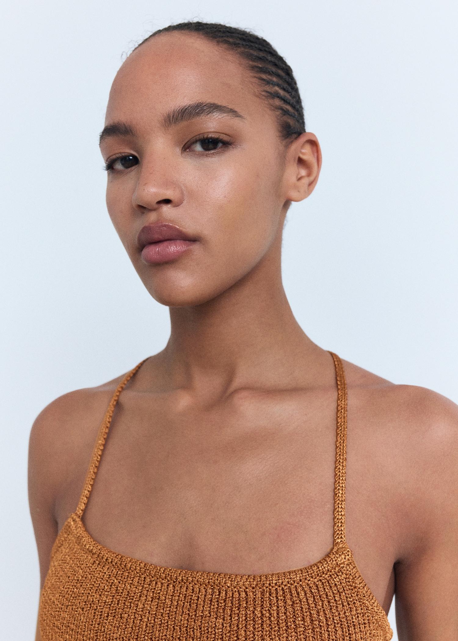 Lurex knitted top with crossed back - Women | MANGO USA Product Image