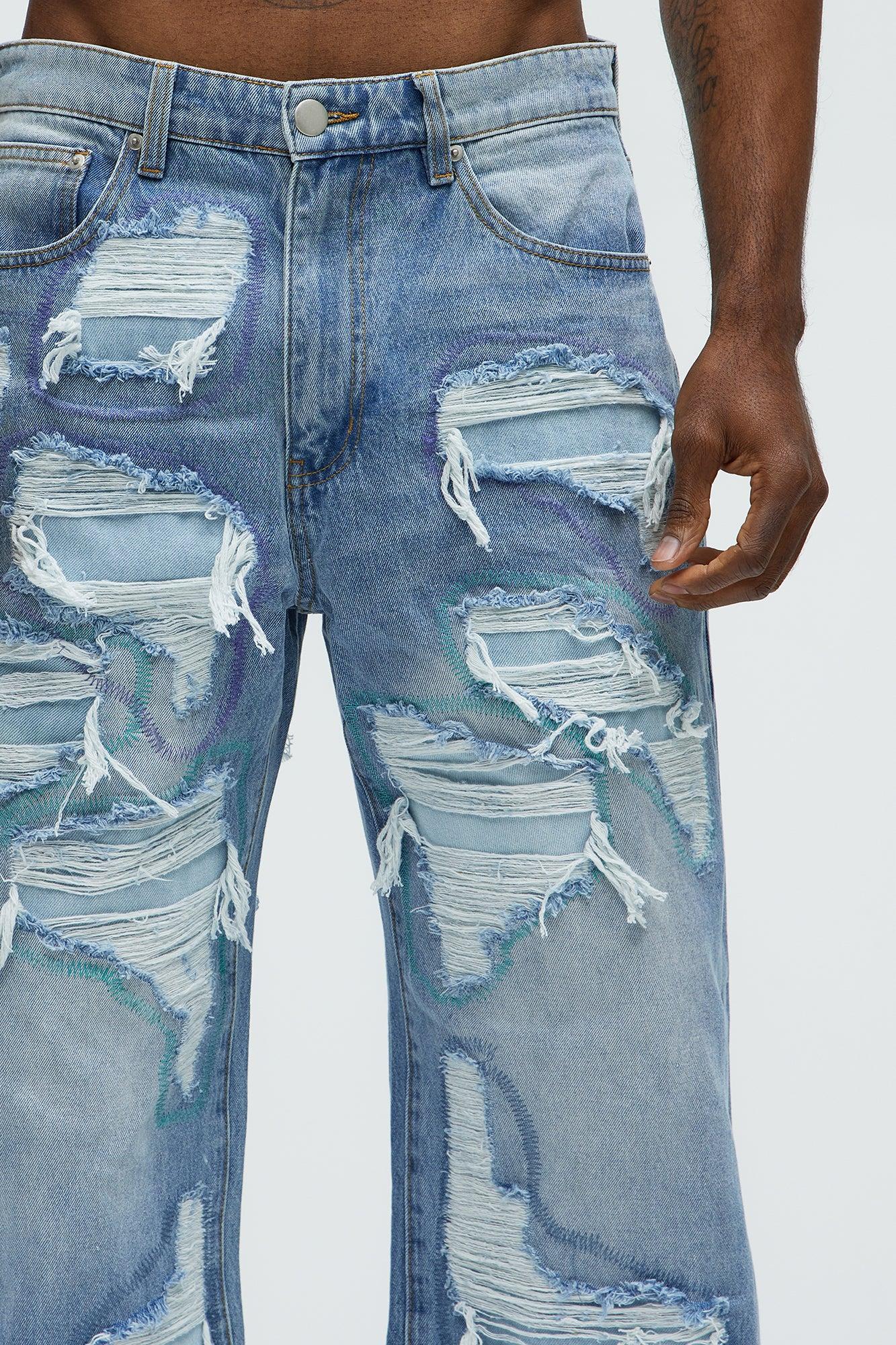 Worn All Over Distressed Baggy Jeans - Light Wash Product Image