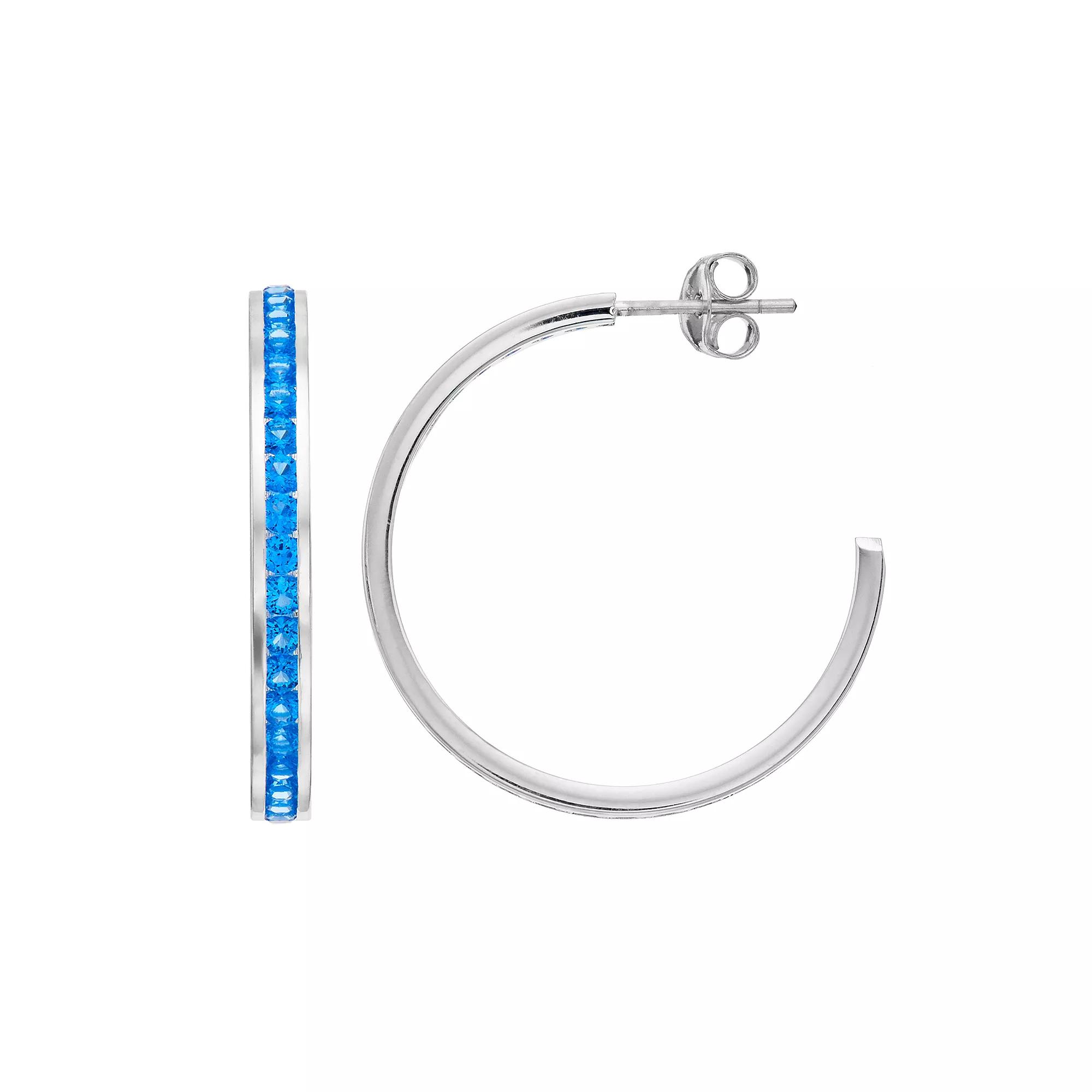 Traditions Jewelry Company Sterling Silver Channel-Set Blue Topaz Birthstone Hoop Earrings, Women's Product Image