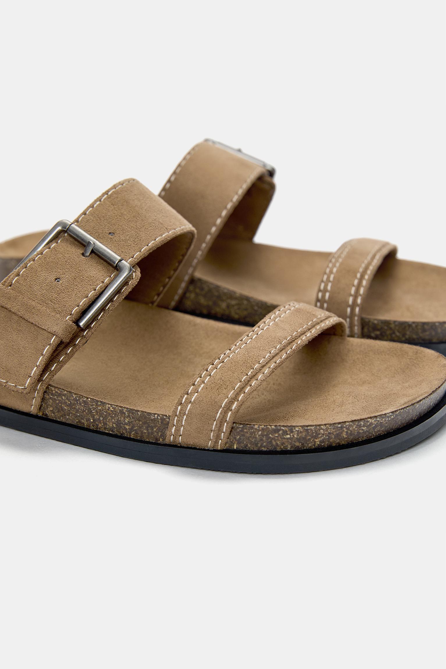 Flat sandals with buckles Product Image