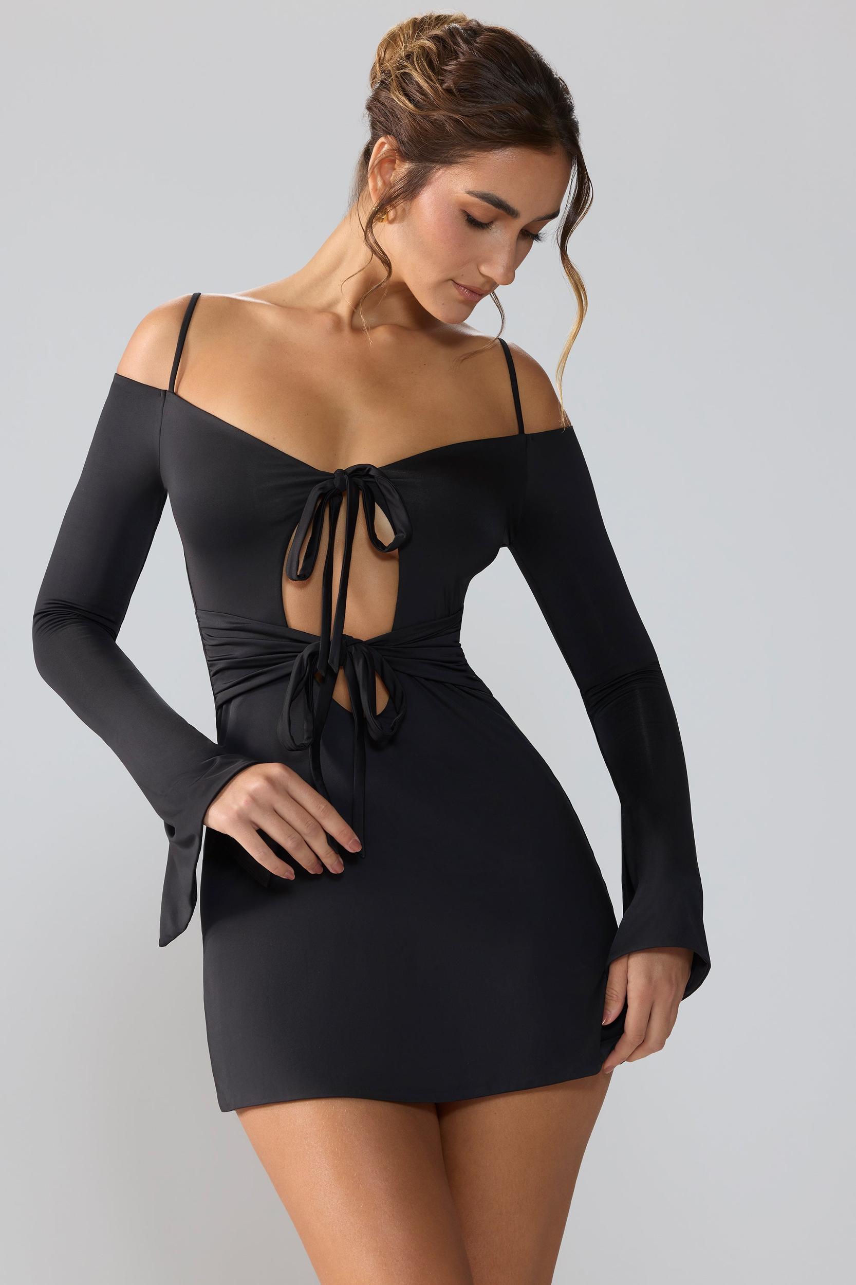 Slinky Jersey Long Sleeve Cut Out Mini Dress in Black Product Image
