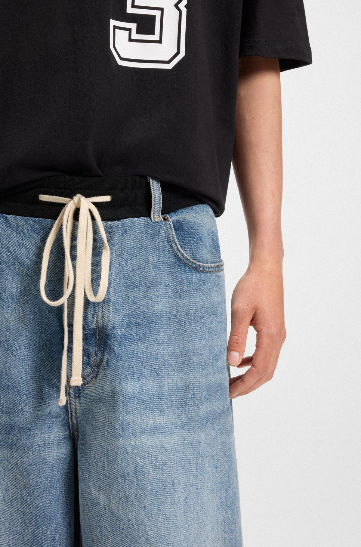 HUGO - Oversize-fit jeans in blue denim with jersey waistband - Turquoise Product Image