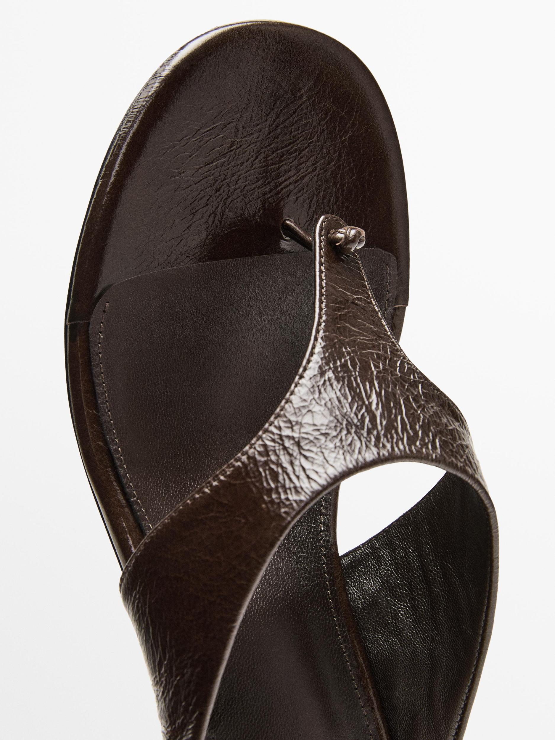 Heeled sandals with toe divider Product Image