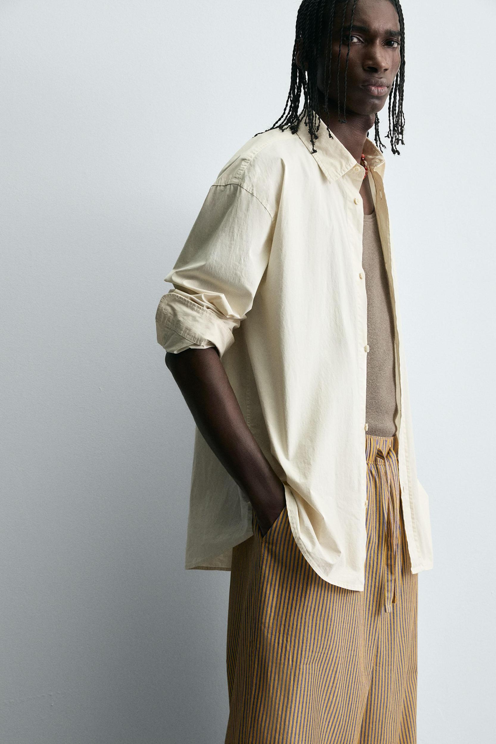 STRIPED OVERSIZED FIT PANTS Product Image