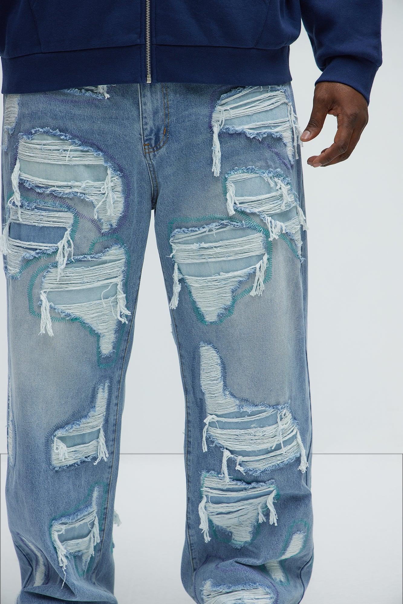 Worn All Over Distressed Baggy Jeans - Light Wash Product Image