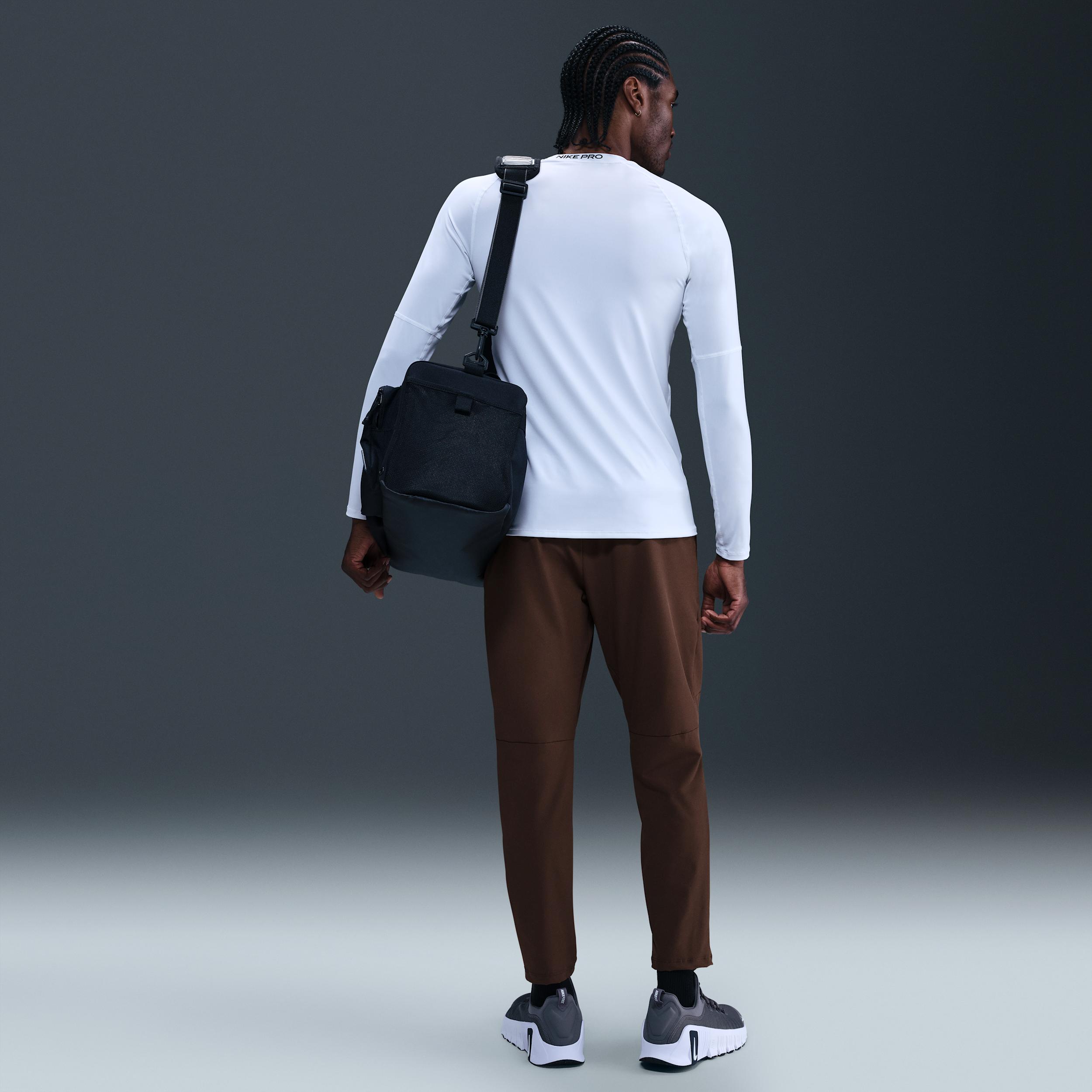 Nike Mens Unlimited Dri-FIT Tapered Leg Versatile Pants | FB7546-237 Product Image