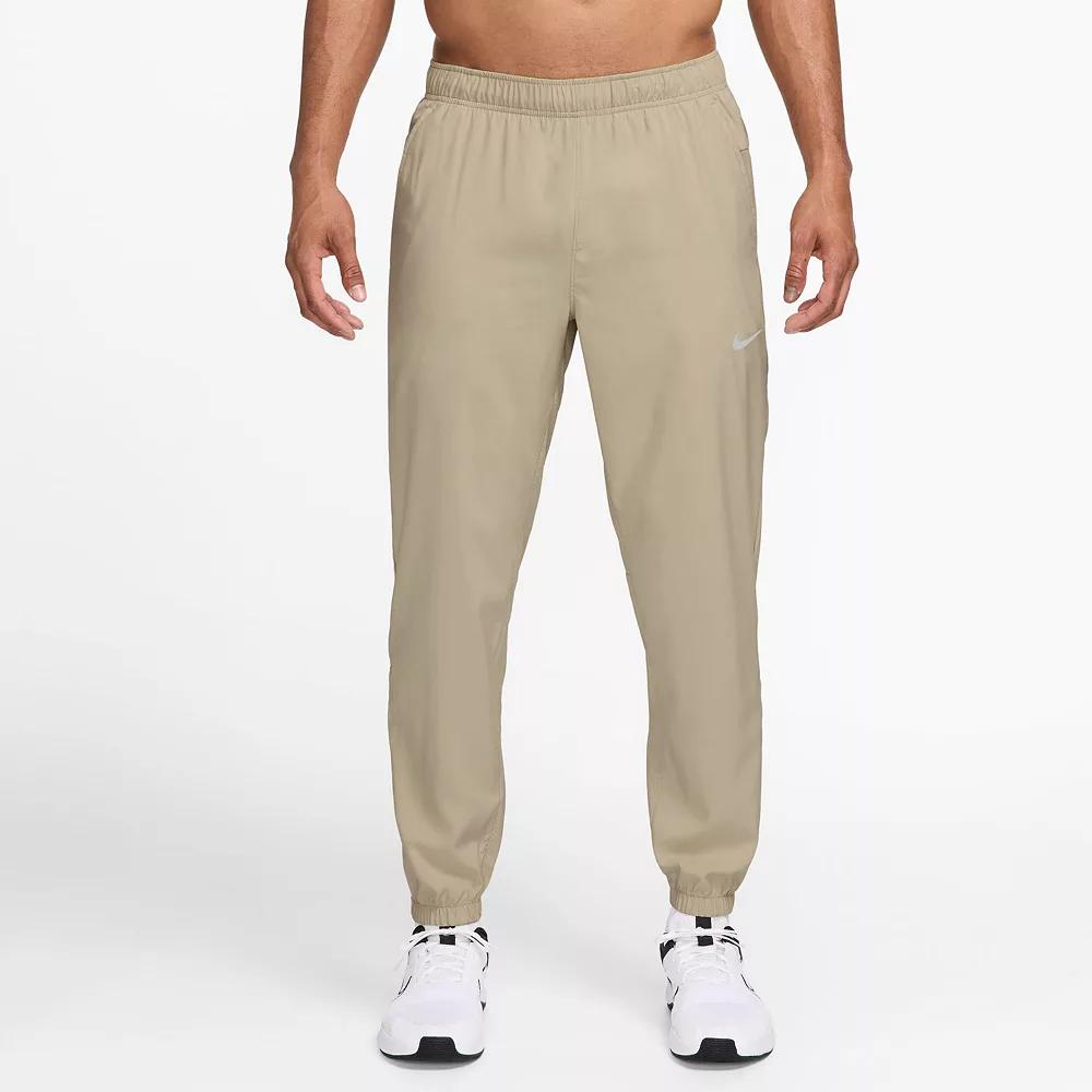 Men's Nike Form Dri-FIT Tapered Versatile Pants, Size: Large, Desert Green Product Image