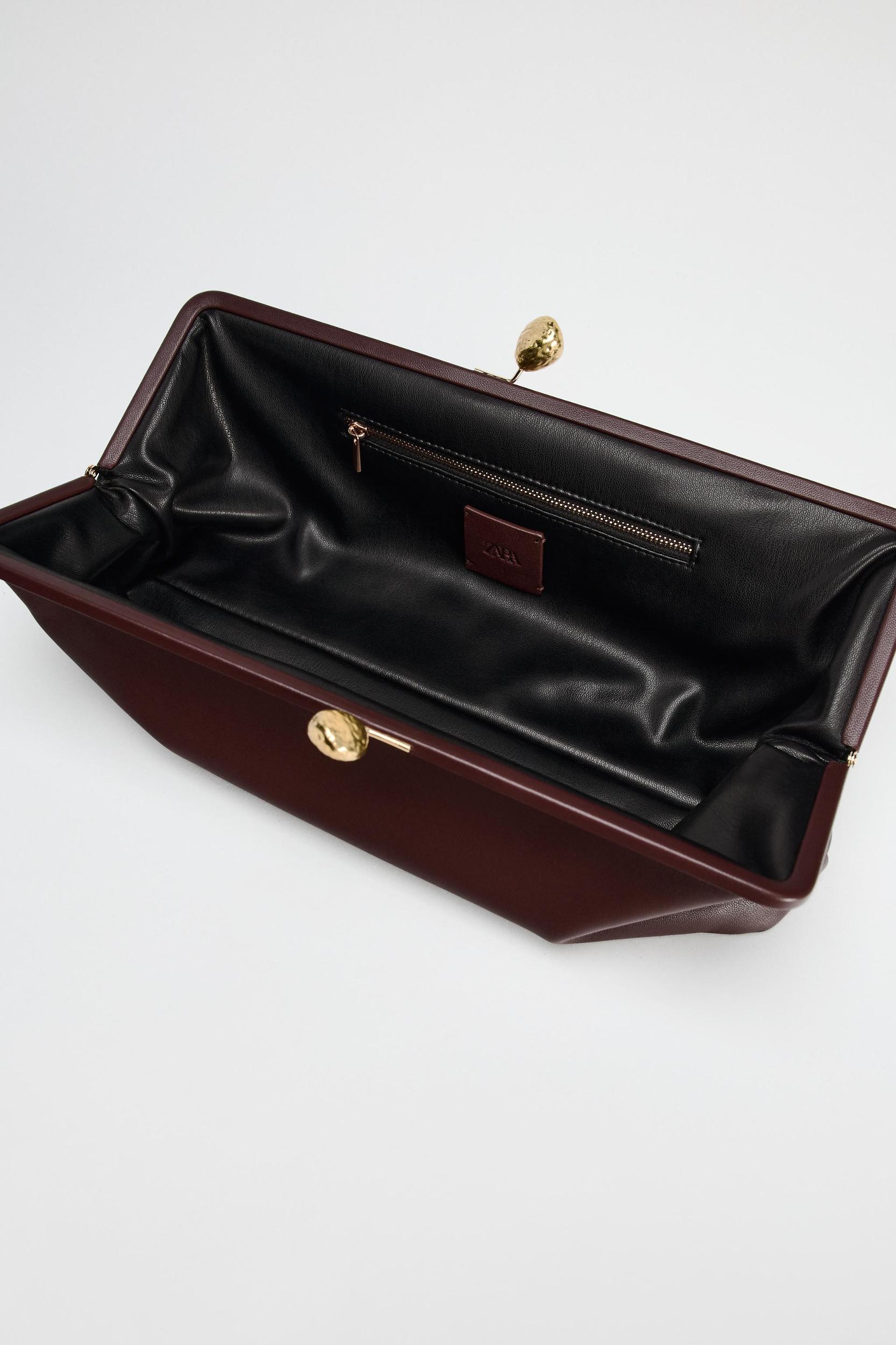 METAL TRIM LEATHER CLUTCH Product Image