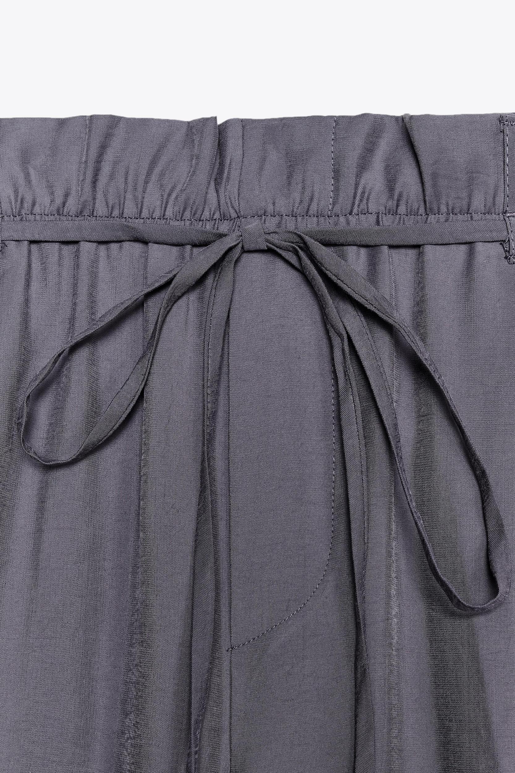 FLOWY PAPERBAG BELTED PANTS Product Image