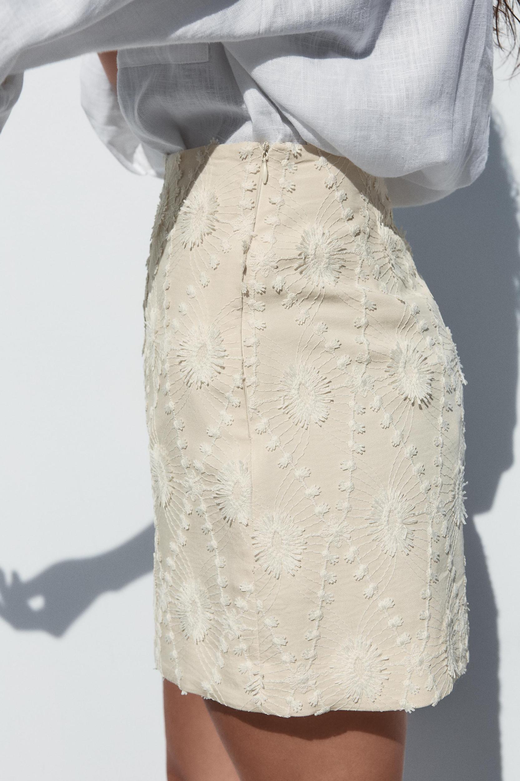 MINI SKIRT WITH FRAYED EMBROIDERY Product Image