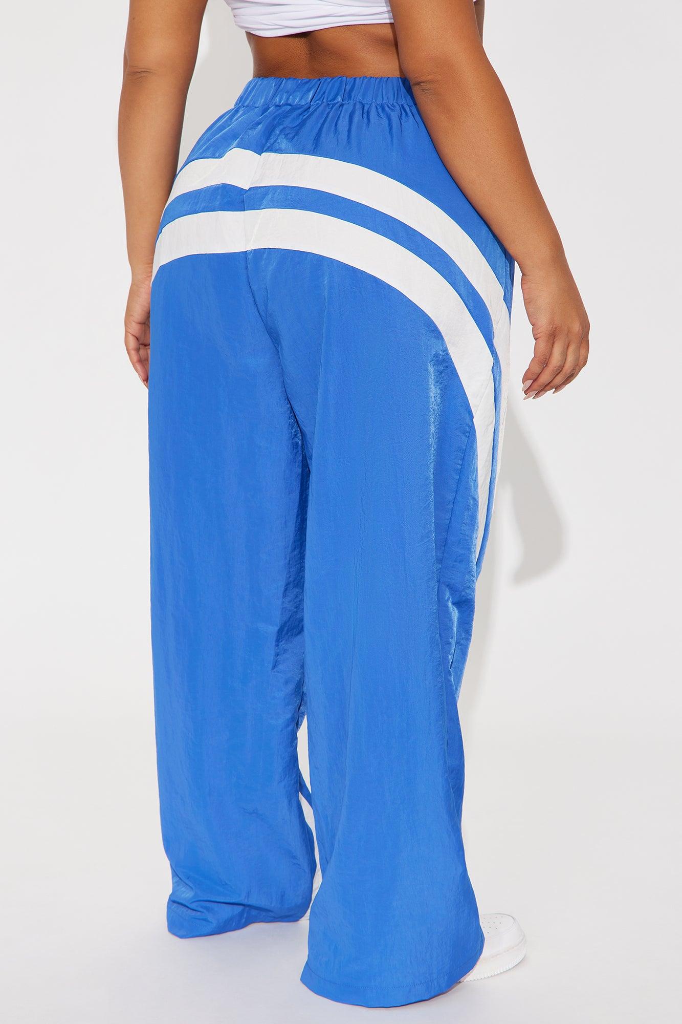 Follow The Curve Windbreaker Track Pant - Blue Female Product Image